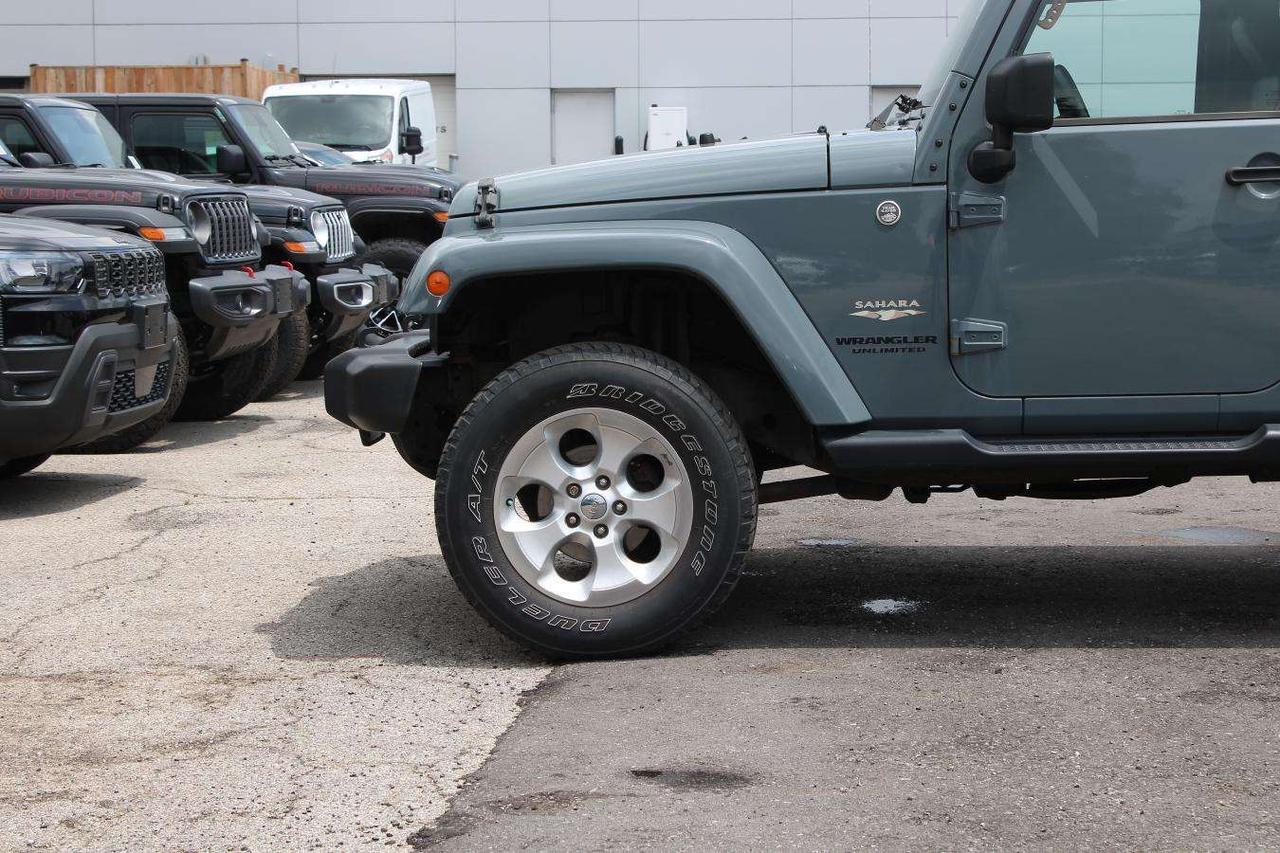 2014 Jeep Wrangler 4WD Sahara  Gps SiriusXM HtdSeats SideSteps Cruise Photo