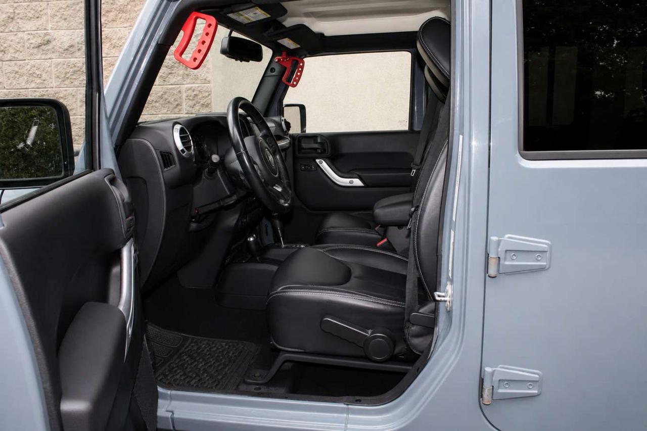 2014 Jeep Wrangler 4WD Sahara  Gps SiriusXM HtdSeats SideSteps Cruise Photo