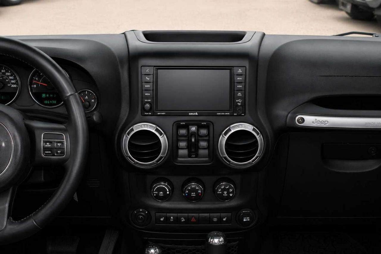 2014 Jeep Wrangler 4WD Sahara  Gps SiriusXM HtdSeats SideSteps Cruise Photo