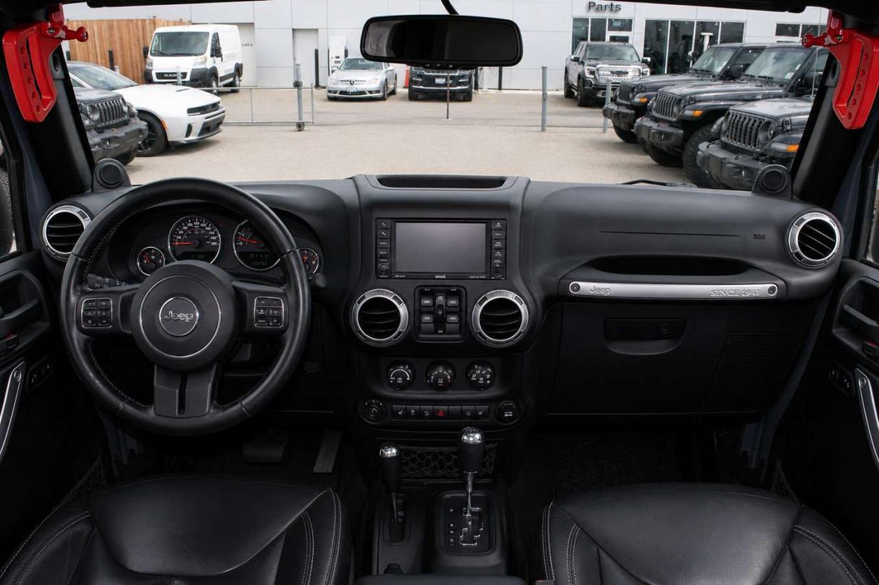 2014 Jeep Wrangler 4WD Sahara  Gps SiriusXM HtdSeats SideSteps Cruise Photo