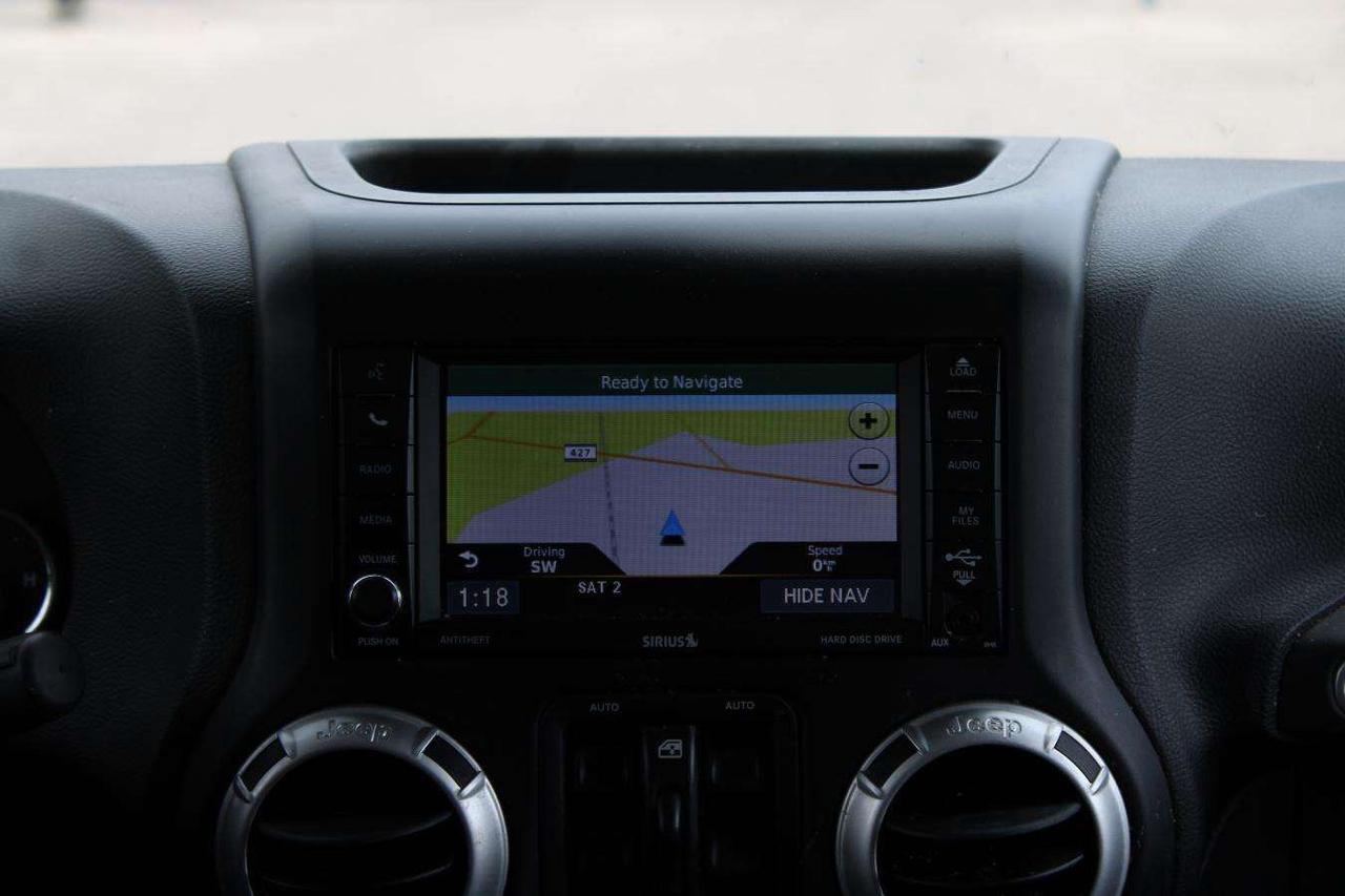 2014 Jeep Wrangler 4WD Sahara  Gps SiriusXM HtdSeats SideSteps Cruise Photo