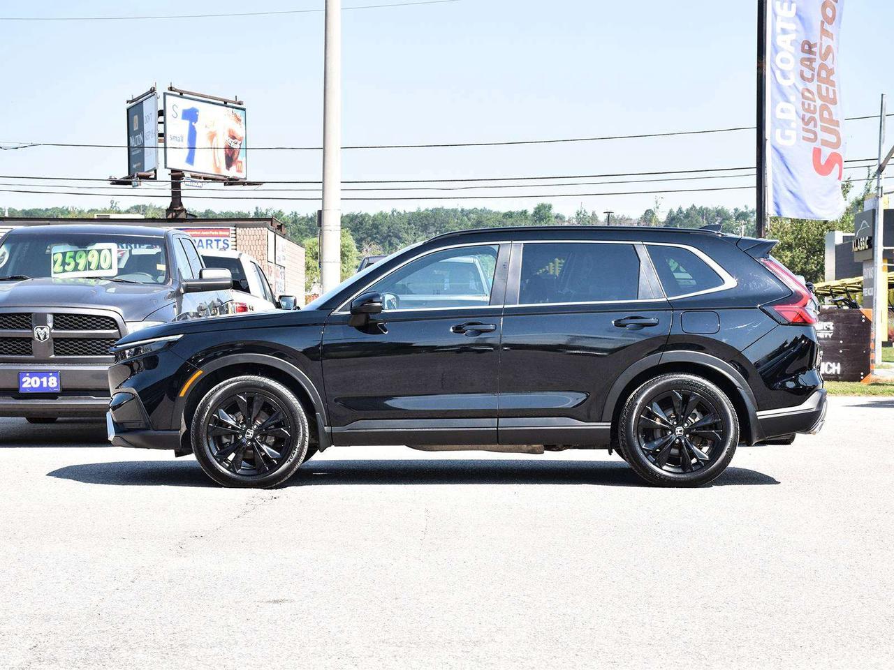 2025 Honda CR-V Touring AWD ~Nav ~Heated Leather ~Sunroof ~Carplay Photo