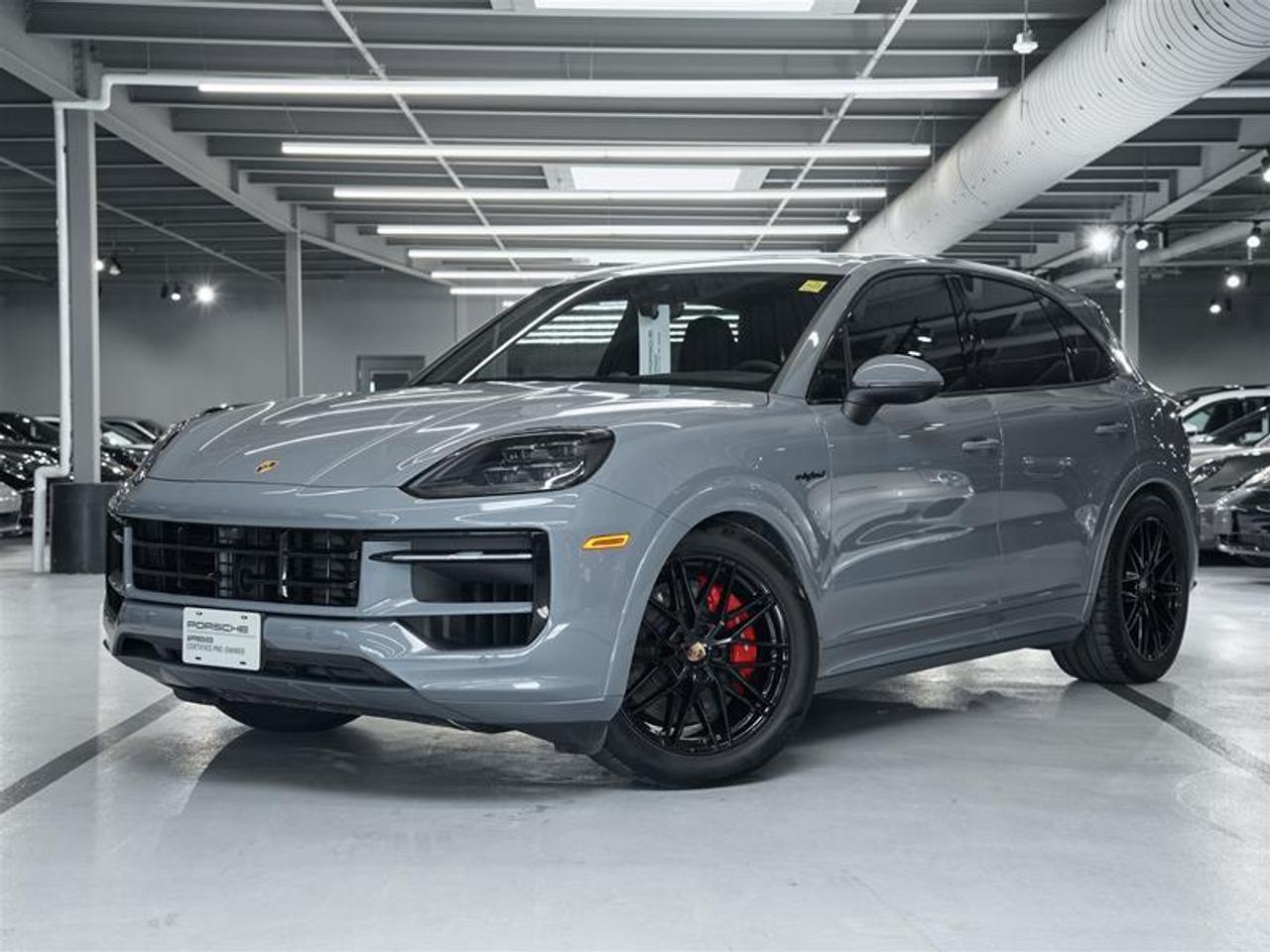 ***Leasing Options Available on Certified Pre-Owned Porsches***  The Porsche that you’ve always wanted. This 2024 Cayenne S E-Hybrid (MY24) has a Clean CarFax Report. With Leather Interior in Black ($4,280), Arctic Grey ($3,590), Premium Package ($4,090), SportDesign Package in High Gloss Black ($7,100), Window Trim in High Gloss Black ($450), PORSCHE Logo and Model Designation on Rear in High Gloss Black ($590), Sport Tailpipes in Dark Bronze ($1,090), 21 RS Spyder Design Wheels in High Gloss Black ($4,560), Adaptive Sport Seats Plus (18-way) with Comfort Memory ($1,960), Heated GT Sport Steering Wheel in Leather ($370), HD-Matrix Design LED Headlights in Black ($3,410), and Surround View ($940), this is the car for you! Look for the Porsche Approved seal when buying a pre-owned Porsche. Porsche Approved Pre-Owned Cars are inspected in compliance with our 111-point checklist and any work required is performed using only 100% Porsche Genuine Parts. As proof of the trust that we have in the quality of our vehicles, every certified pre-owned car comes with a minimum of 24 months Porsche Approved Warranty and Porsche Roadside Assistance. The Porsche Approved Warranty covers all components of your Porsche and offers the same level of security as our new car warranty. Luxury Tax is not charged on Certified Pre-Owned vehicles. Call us at 613-749-4275 and ask to speak to one of our Porsche Brand Executives. Serving the Ottawa & Gatineau region. *** Options de location disponibles pour les Porsche doccasion certifiées ***  La Porsche de vos rêves. Cette voiture 2024 Cayenne S E-Hybrid (MY24) a un bon rapport d’historique de véhicule de CarFax. Grâce à Leather Interior in Black ($4,280), Arctic Grey ($3,590), Premium Package ($4,090), SportDesign Package in High Gloss Black ($7,100), Window Trim in High Gloss Black ($450), PORSCHE Logo and Model Designation on Rear in High Gloss Black ($590), Sport Tailpipes in Dark Bronze ($1,090), 21 RS Spyder Design Wheels in High Gloss Black ($4,560), Adaptive Sport Seats Plus (18-way) with Comfort Memory ($1,960), Heated GT Sport Steering Wheel in Leather ($370), HD-Matrix Design LED Headlights in Black ($3,410), and Surround View ($940), cette voiture est parfaite pour vous! Trouvez le sceau d’approbation de Porsche lorsque vous achetez une Porsche d’occasion. Les voitures d’occasion approuvées par Porsche sont inspectées conformément à notre liste de vérification de 111 points. Tout travail requis est effectué en utilisant uniquement des pièces d’origine Porsche. Comme preuve de la confiance que nous avons dans la qualité de nos véhicules, chaque voiture d’occasion certifiée fait l’objet d’une garantie d’au moins 24 mois approuvée par Porsche et de l’assistance routière Porsche. La garantie approuvée par Porsche couvre tous les composants de votre Porsche et offre le même niveau de sécurité que notre garantie pour les véhicules neufs. La taxe de luxe n’est pas appliquée aux véhicules d’occasion certifiés. Appelez-nous au 613-749-4275 pour parler à l’un de nos directeurs de marque Porsche. Au service de la région d’Ottawa et du Gatineau.