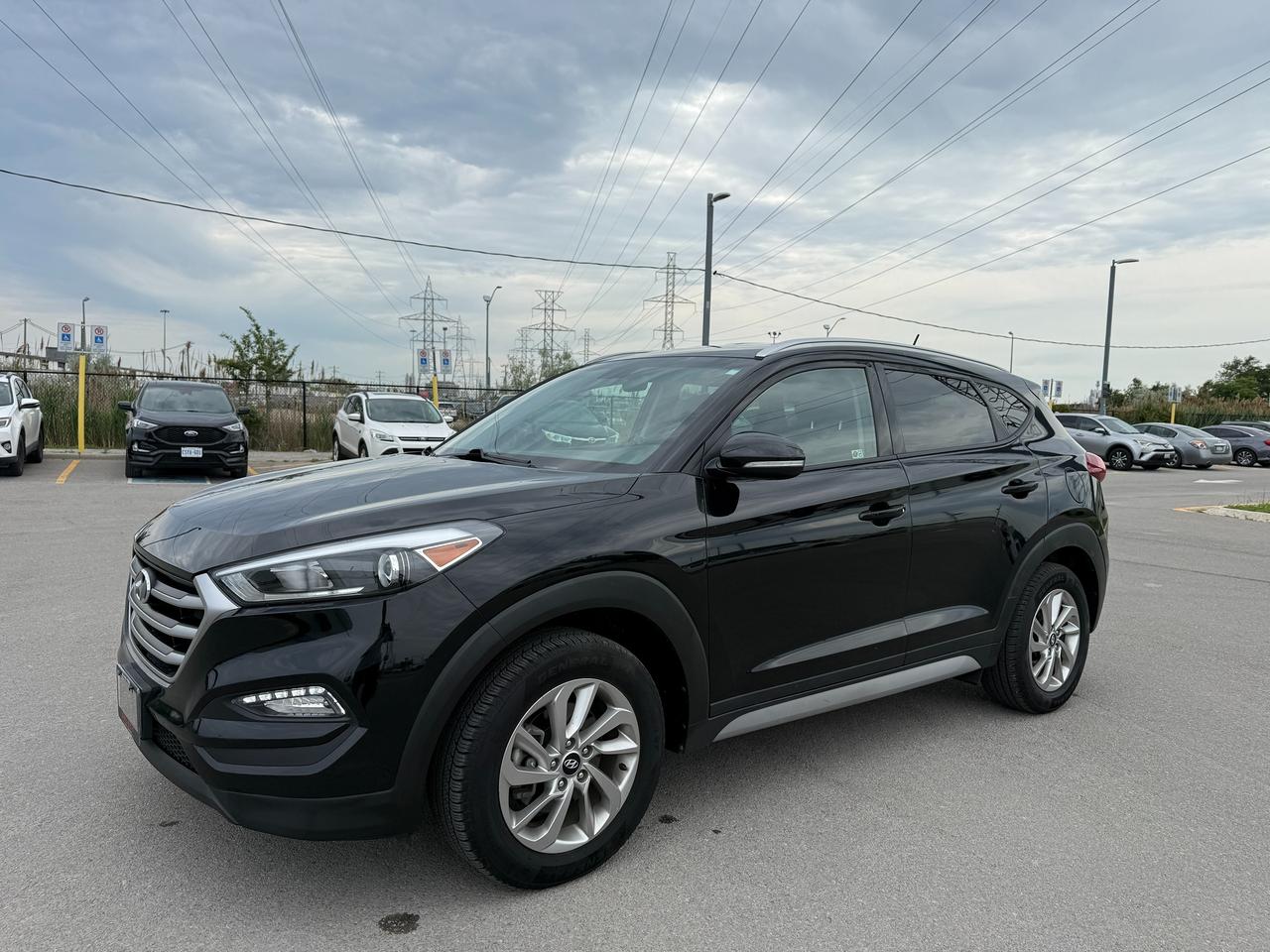 <h3><strong>Only 26,502 Original Kilometres | Clean CARFAX | Full Hyundai Dealer Service History</strong></h3><p class=isSelectedEnd><strong>💲Only $17,888 + HST &ndash; Fully Certified with NO Hidden Fees!</strong></p><p class=isSelectedEnd>Finding a 2017 Hyundai Tucson with only <strong>26,502 original kilometres</strong> is almost unheard of. In fact, this may be <strong>one of the lowest-kilometre 2017 Hyundai Tucsons available anywhere in Canada.</strong> If youve been searching for an exceptionally clean, well-maintained SUV, this is the one.</p><p class=isSelectedEnd>Finished in a stunning <strong>Black exterior with a Black interior</strong>, this Tucson Premium has been meticulously cared for since new. It comes with a <strong>Clean CARFAX</strong>, <strong>complete Hyundai dealer service records</strong>, and has been <strong>fully certified</strong> for your peace of mind. No surprises, no gimmicks&mdash;just an outstanding SUV at an incredible value.</p><h3><strong>Why This Tucson Stands Out:</strong></h3><p class=isSelectedEnd>✔ <strong>Only 26,502 Original Kilometres</strong> &ndash; An exceptionally rare find and possibly one of Canadas lowest-kilometre 2017 Tucsons.<br>✔ <strong>Clean CARFAX</strong> &ndash; Accident-free history for complete confidence.<br>✔ <strong>Full Hyundai Dealer Service Records</strong> &ndash; Professionally maintained from new with documented service history.<br>✔ <strong>Premium Trim Package</strong> &ndash; Loaded with comfort, technology, and convenience features.<br>✔ <strong>Fully Certified</strong> &ndash; Ready for the road with no additional certification costs.</p><h3><strong>Our Price</strong></h3><p class=isSelectedEnd><strong>Only $17,888 + HST & Licensing</strong><br><strong>✔ Fully Certified</strong><br><strong>✔ No Hidden Fees</strong><br><strong>✔ Buy with Confidence</strong></p><p class=isSelectedEnd>Opportunities like this dont come around often. Vehicles with <strong>ultra-low kilometres</strong>, a <strong>Clean CARFAX</strong>, and <strong>full dealer service history</strong> are incredibly difficult to find. Dont miss your chance to own one of the cleanest 2017 Hyundai Tucsons on the market.</p><p class=isSelectedEnd><em>Powered by AutoIntelligence&trade;</em></p><p><em>Vehicle information has been generated using artificial intelligence and is provided for informational purposes only. While every effort is made to ensure accuracy, please confirm all details directly with the dealer.</em></p>