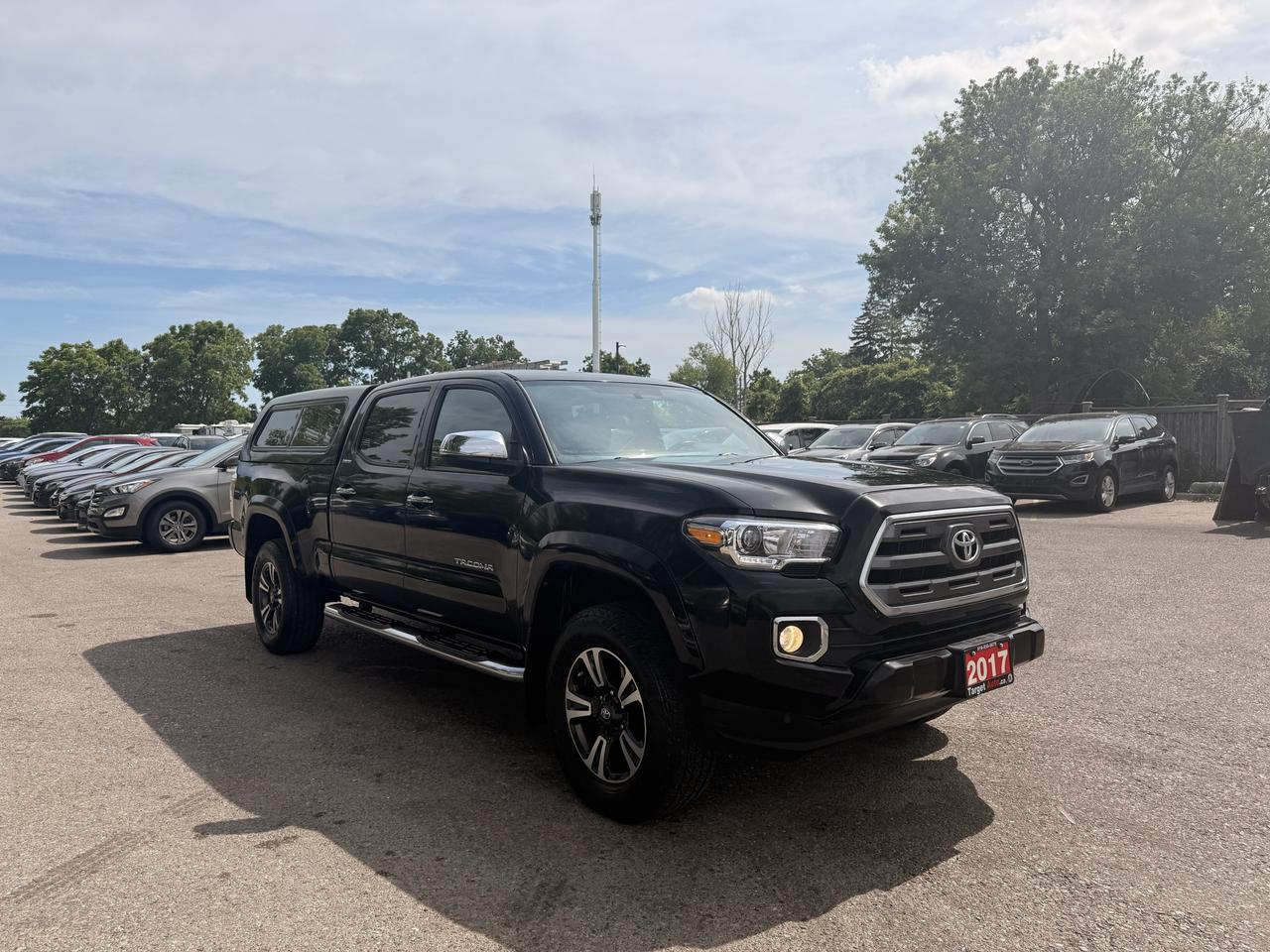 <p>Get ready to conquer any terrain and tackle any task with this exceptional 2017 Toyota Tacoma Limited, now available at Target Auto Centre. Dressed in a sleek, timeless black exterior and complemented by a refined brown interior, this Tacoma is as stylish as it is capable. Under the hood, the robust 3.5L V6 engine paired with a smooth automatic transmission and legendary 4-wheel drive system ensures you have the power and confidence to go wherever your adventures take you. Whether youre heading to the worksite, exploring off-road trails, or simply navigating your daily commute, this four-door pickup truck is built to impress.&nbsp;This 2017 Toyota Tacoma Limited has been well-loved and comes with 241,229 km on the odometer, a testament to its enduring Toyota reliability. At Target Auto Centre, we know what drivers are looking for, and this Tacoma delivers. Its more than just a truck; its your partner in adventure and productivity.</p><p>&nbsp;</p><hr><p>&nbsp;</p><p dir=ltr><strong>CERTIFIED PRE-OWNED VEHICLE | BUY WITH CONFIDENCE</strong></p><p dir=ltr>&nbsp;- Ontario Safety Standards Certificate Included<br>- 30 Day / 1,000 KM Safety Warranty Included<br>- Fully Detailed Prior to Delivery<br>- CARFAX Vehicle History Report Available<br>&nbsp; (View on Our Website)</p><p dir=ltr>&nbsp;</p><hr><p>&nbsp;</p><p dir=ltr><strong>FINANCING MADE SIMPLE | ALL CREDIT WELCOME</strong></p><p dir=ltr>&nbsp;- $0 Down Payment Options Available<br>- Competitive Rates Through Trusted Lenders<br>- Fast Approvals | Simple Application Process<br>- On-site Financing Assistance<br>- Good Credit | Bad Credit | No Credit Options<br>- <a href=https://targetauto.ca/financing/>Apply Now</a></p><p>&nbsp;</p><hr><p>&nbsp;</p><p dir=ltr><strong>VALUE AND TRANSPARENCY | WHY CHOOSE US</strong></p><p dir=ltr>- Price Plus HST & Licensing Only<br>- No Additional Fees | All-In Pricing<br>- Same Price Cash or Finance<br>- Extended Warranty Protection Plans Available<br>- Autotrader Best Priced Dealer Award (2024)<br>- Competitive Market Value on Trade-ins<br>- We&rsquo;ll Buy Your Car &mdash; No Purchase Required<br>- Know Someone Looking For a Vehicle? Get a Referral Award<br>- Open 7 Days a Week</p><p>&nbsp;</p><hr><p>&nbsp;</p><p dir=ltr><strong>ABOUT TARGET AUTO CENTRE</strong></p><p dir=ltr>Target Auto Centre has been proudly serving London, Ontario and surrounding areas for over 20 years, offering over 150 quality pre-owned vehicles and a constantly updated selection to choose from. We focus on providing competitive pricing, clear information, and a straightforward buying process so you know exactly what to expect from start to finish.</p><p dir=ltr>Cars For Everyone! We offer a wide selection of vehicles to fit every lifestyle, need, and budget. Our inventory includes cars, trucks, SUVs, and vans from trusted brands such as Ford, Chevrolet, Toyota, Honda, Nissan, BMW, Mercedes-Benz, Audi, Lexus, Acura, Hyundai, Kia, Mazda, Volkswagen, Jeep, RAM, GMC, Subaru, and more. With new arrivals regularly, there&rsquo;s always something for everyone.</p><p dir=ltr>As a proud member of the Used Car Dealers Association of Ontario (UCDA), we are committed to operating with honesty, transparency, and professionalism in every transaction. Our goal is to make your vehicle purchase as simple and stress-free as possible, while delivering the level of service our customers continue to trust. Come visit us today and see why were the preferred choice for pre-owned vehicles in London and the surrounding areas. We look forward to earning your business!</p>