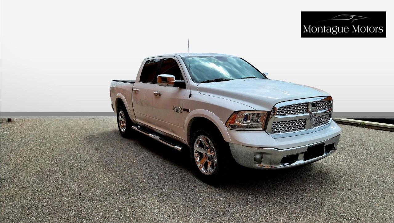2016 RAM 1500 4WD Crew Cab 5.7 Ft Box Laramie Photo2