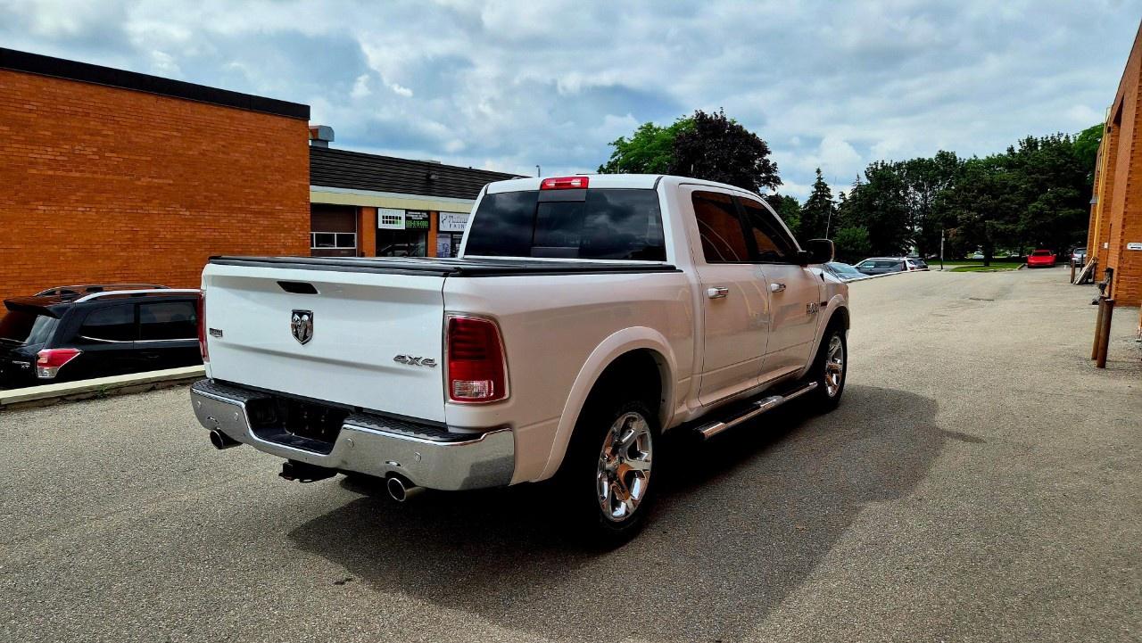 2016 RAM 1500 4WD Crew Cab 5.7 Ft Box Laramie Photo4