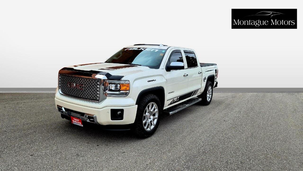 <h2>THE PINNACLE OF TRUCK LUXURY: 2015 GMC Sierra 1500 Denali</h2><h3>CREW CAB | 4x4 | POWERFUL V8 | 160,000 KM</h3><p>Why settle for an ordinary truck when you can drive the gold standard of luxury pickups? This <strong>2015 GMC Sierra 1500 Denali</strong> combines elite craftsmanship, bold styling, and uncompromising capability. With 160,000 km, this premium Crew Cab 4WD is fully broken-in and ready to provide its next owner with a first-class driving experience, whether towing a trailer or heading out for a night on the town.</p><p><strong>The Denali Distinction:</strong></p><ul><li><p><strong>Elite Styling:</strong> Featuring the unmistakable Denali signature chrome grille, chrome accents, and premium wheels.</p></li><li><p><strong>Advanced Ride Comfort:</strong> Equipped with Magnetic Ride Controlreal-time damping that delivers an exceptionally smooth, SUV-like ride.</p></li><li><p><strong>Spacious Crew Cab:</strong> Generous rear-seat legroom and premium storage solutions for the ultimate family or crew hauler.</p></li><li><p><strong>True 4x4 Capability:</strong> Built to handle Canadian winters, slick boat ramps, and muddy job sites with ease.</p></li></ul><h3>Vehicle Specifications</h3><ul><li><p><strong>Engine:</strong> Robust EcoTec3 V8 engine delivering effortless towing power and a commanding exhaust note.</p></li><li><p><strong>Drivetrain:</strong> Four-Wheel Drive (4WD) with an electronic automatic transfer case.</p></li><li><p><strong>Transmission:</strong> Smooth-shifting automatic transmission optimized for fuel efficiency and power delivery.</p></li><li><p><strong>Mileage:</strong> <strong>160,000 km</strong>  exceptionally well-maintained and ready for many more miles.</p></li><li><p><strong>Cab Configuration:</strong> Crew Cab with a versatile short bed, offering the perfect balance of interior space and parking convenience.</p></li></ul><h3>Premium Denali Features</h3><ul><li><p><strong>First-Class Interior:</strong> High-grade, leather-appointed seating with unique Denali stitching and authentic aluminum trim.</p></li><li><p><strong>All-Season Luxury:</strong> <strong>Heated and ventilated</strong> front bucket seats, a <strong>heated steering wheel</strong>, and dual-zone automatic climate control.</p></li><li><p><strong>High-End Technology:</strong> 8-inch customizable driver display instrument cluster alongside an 8-inch Color Touch Navigation radio featuring GMC IntelliLink.</p></li><li><p><strong>Premium Audio:</strong> Concert-quality <strong>Bose</strong> premium audio system for crystal-clear sound.</p></li><li><p><strong>Safety & Convenience:</strong> Front and Rear Park Assist, Forward Collision Alert, Lane Departure Warning, backup camera, and remote vehicle start.</p></li><li><p><strong>Premium Accents:</strong> 20-inch ultra-bright machined aluminum wheels, projector LED headlamps, and a factory spray-on bedliner.</p></li></ul><p>Credit Cards Accepted</p><p>Please call for more info and to book a test drive at 888-996-6510. Car-Fax is included in the asking price. Extended Warranties are also available. We offer financing too. Certification: Have your new pre-owned vehicle certified. We offer a full safety inspection including oil change, and professional detailing prior to delivery. Certification package is available for $799. All trade-ins are welcome. Taxes and licensing are extra.***</p>
