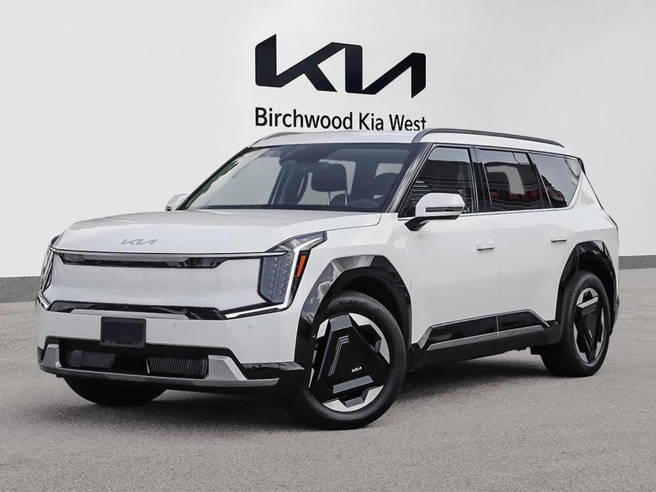 Experience is Everything at Birchwood Kia West!  It is our mission to provide the most transparent and time efficient sales process out of any Manitoba Kia Dealer!  Come visit us and see for yourself why we have a 4.4 star google rating!
The 2026 Kia EV9 AWD is a three-row all-electric SUV built for families who refuse to compromise between capability and sustainability. With a massive 99.8 kWh battery, rapid DC fast charging, and a full suite of advanced driver assistance technology, this EV9 is one of the most well-equipped electric SUVs on the road today.

- All-Wheel Drive (AWD) electric powertrain delivering confident performance in all Manitoba weather conditions
- 99.8 kWh Lithium-Ion battery with DC fast charge capability (approx. 1.38 hrs at 440V) for minimal downtime on long trips
- Highway Driving Assist (HDA) for semi-autonomous highway travel, reducing fatigue on longer drives
- Driver Monitoring Alert and Evasion Assist  advanced safety tech that goes beyond standard collision warnings
- Integrated Navigation System with Voice Activation and built-in Mobile Hotspot for always-connected journeys
- Blind-Spot Collision-Avoidance Assist, Rear Cross-Traffic Collision Avoidance, and Front & Rear Parking Sensors for confident maneuvering
- 20 Alloy Wheels with Aerodynamic Covers balancing a bold exterior presence with optimized EV range
- Heated leatherette steering wheel and Pecan Brown interior trim for a premium, refined cabin feel

Ready to experience the EV9 for yourself? Reserve yours online, start your purchase at birchwoodkiawest.ca, or book a test drive appointment with our team today. Have questions? Contact us  were here to make the process easy, transparent, and enjoyable. Experience is Everything at Birchwood Kia West!
ADDITIONAL ACCESSORIES INCLUDED: 

*Kia Genuine All-Weather Floor Mats
*Premium DEFA Block Heater
*Kia Genuine Wheel Locks
*Kia Genuine Touch-Up Paint

You might qualify for additional savings on your purchase! Ask us about our:

$500 Grad Program
$750 Mobility Assistance Program
$500 Military Benefit
1% Loyalty Rate Reduction 

FIND MORE INFORMATION AND VIEW MORE OPTIONS

*Visit us! Birchwood Kia West in the Birchwood Auto Park. Portage Ave & The Perimeter!
*Visit www.birchwoodkiawest.ca
*Contact our sales department at (204) 888-4542

*Whenever possible, the vehicle photos shown are of the ACTUAL vehicle. This provides the best online shopping experience for our valued customers.
*Price includes all options, fees, and levies. No additional charges are applied.
*Additional fees may apply to select finance and lease options. 
*Dealer Permit #4302
Dealer permit #4302