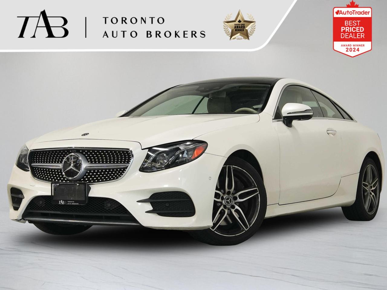 This 2018 Mercedes-Benz E 400 Coupe is a local Ontario vehicle that combines elegant styling, refined luxury, and effortless performance in a sophisticated grand touring coupe. Powered by a 3.0L twin-turbocharged V6 engine paired with Mercedes-Benzs smooth 9-speed automatic transmission and 4MATIC all-wheel drive, the E 400 delivers confident performance and year-round capability. Finished with the exclusive designo interior, this coupe offers premium craftsmanship, advanced technology, and exceptional comfort for every drive.

Key Features:

3.0L Twin-Turbocharged V6 Engine
4MATIC All-Wheel Drive (AWD)
Designo Premium Leather Interior
Panoramic Glass Sunroof
LED Intelligent Light System
19-Inch Alloy Wheels
Heated Power Front Seats with Memory
Burmester&reg; Surround Sound System
COMAND Navigation System

NOW OFFERING 3 MONTH DEFERRED FINANCING PAYMENTS ON APPROVED CREDIT. 

WE OFFER THE BEST FINANCE RATES, AND DONT CHARGE ANY FINANCING FEE

Looking for a top-rated pre-owned luxury car dealership in the GTA? Look no further than Toronto Auto Brokers (TAB)! Were proud to have won multiple awards, including the 2024 AutoTrader Best Priced Dealer, the 2026 Best in Business award, the 2025 CarGurus Award, the 2026 Top Choice Award, the 2026 Dealer Rater Consumer Satisfaction Award, the 2026 Canadian Choice Award, the 2026 Three Best Rated Dealer Award, and many more!

With 30 years of experience serving the Greater Toronto Area, TAB is a respected and trusted name in the pre-owned luxury car industry. Our 30,000 sq.Ft indoor showroom is home to a wide range of luxury vehicles from top brands like BMW, Mercedes-Benz, Audi, Porsche, Land Rover, Jaguar, Aston Martin, Bentley, Maserati, and more. And we dont just serve the GTA, were proud to offer our services to all cities in Canada, including Vancouver, Montreal, Calgary, Edmonton, Winnipeg, Saskatchewan, Halifax, and more.

At TAB, were committed to providing a no-pressure environment and honest work ethics. As a family-owned and operated business, we treat every customer like family and ensure that every interaction is a positive one. Come experience the TAB Lifestyle at its truest form, luxury car buying has never been more enjoyable and exciting!

We offer a variety of services to make your purchase experience as easy and stress-free as possible. From competitive and simple financing and leasing options to extended warranties, aftermarket services, and full history reports on every vehicle, we have everything you need to make an informed decision. We welcome every trade, even if youre just looking to sell your car without buying, and when it comes to financing or leasing, we offer same day approvals, with access to over 50 lenders, including all of the banks in Canada. Feel free to check out your own Equifax credit score without affecting your credit score, simply click on the Equifax tab above and see if you qualify.


Call us today or visit our website to learn more about our inventory and services. And remember, all prices exclude applicable taxes and licensing, and vehicles can be certified at an additional cost of $999.