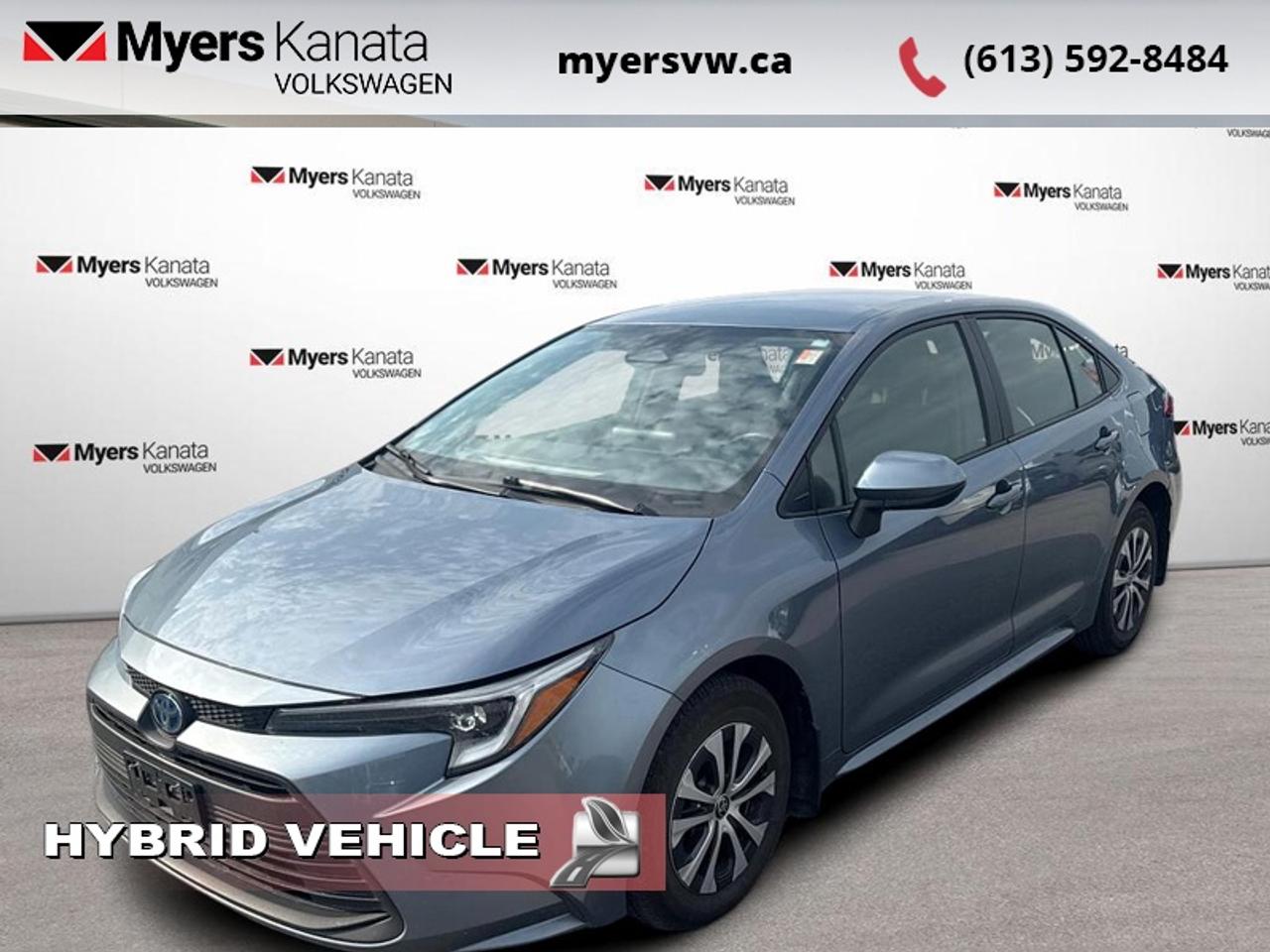 <b>Heated Seats,  Blind Spot Detection,  Lane Keep Assist,  LED Lights,  Apple CarPlay!</b><br> <br>  Compare at $26793 - Our Price is just $26013! <br> <br>Engineered to last, this 2024 Toyota Corolla is a great option for shoppers in the compact sedan segment. This 2024 Toyota Corolla is for sale today in Kanata.<br> <br>With a distinctive design, robust engineering and all-round practicality, this 2024 Corolla is a popular choice for shoppers who prioritize safety and style. A well-built interior with amazing standard technology ensures that this sedan withstands the day-to-day activities of an urban commute. A roomy cabin with comfortable ride quality ensures that occupants enjoy a smooth journey, both in the city and the highway.<br> <br>This sedan has 90,547 km. Its nice in colour. It has an Automatic transmission and is powered by a 138HP 1.8L 4 Cylinder Engine. <br> <br> Our Corollas trim level is Hybrid LE. This Corolla Hybrid LE is amazing on efficiency and boasts several features like heated front seats, automatic climate control, sleek Bi-LED headlights, a larger 8 inch touchscreen display featuring Apple CarPlay, Android Auto, advanced voice recognition, 6 speakers, next gen USB 2.0 audio ports, wireless streaming audio, SIRI Eyes Free and a handy rear view camera. Additional features include blind spot detection, remote keyless entry, Toyota Safety Sense, dynamic radar cruise control, lane departure warning with lane steering assist, power adjustable heated mirrors and so much more. This vehicle has been upgraded with the following features: Heated Seats, Blind Spot Detection, Lane Keep Assist, LED Lights, Apple CarPlay, Android Auto, Adaptive Cruise Control.<br> <br>To apply right now for financing use this link: <a href=https://www.myersvw.ca/financing-request/ target=_blank>https://www.myersvw.ca/financing-request/</a><br> <br/><br>Backed by Myers Exclusive NO Charge Engine/Transmission for life program lends itself for your peace of mind and you can buy with confidence. Call one of our experienced Sales Representatives today and book your very own test drive! Why buy from us? Move with the Myers Automotive Group since 1942! We take all trade-ins - Appraisers on site - Full safety inspection including e-testing and professional detailing prior delivery! <br><br>*LIFETIME ENGINE TRANSMISSION WARRANTY NOT AVAILABLE ON VEHICLES MARKED AS-IS, VEHICLES WITH KMS EXCEEDING 140,000KM, VEHICLES 8 YEARS & OLDER, OR HIGHLINE BRAND VEHICLES (eg.BMW, INFINITI, CADILLAC, LEXUS...). FINANCING OPTIONS NOT AVAILABLE ON VEHICLES MARKED AS-IS OR AS-TRADED.<br> Come by and check out our fleet of 40+ used cars and trucks and 140+ new cars and trucks for sale in Kanata.  o~o