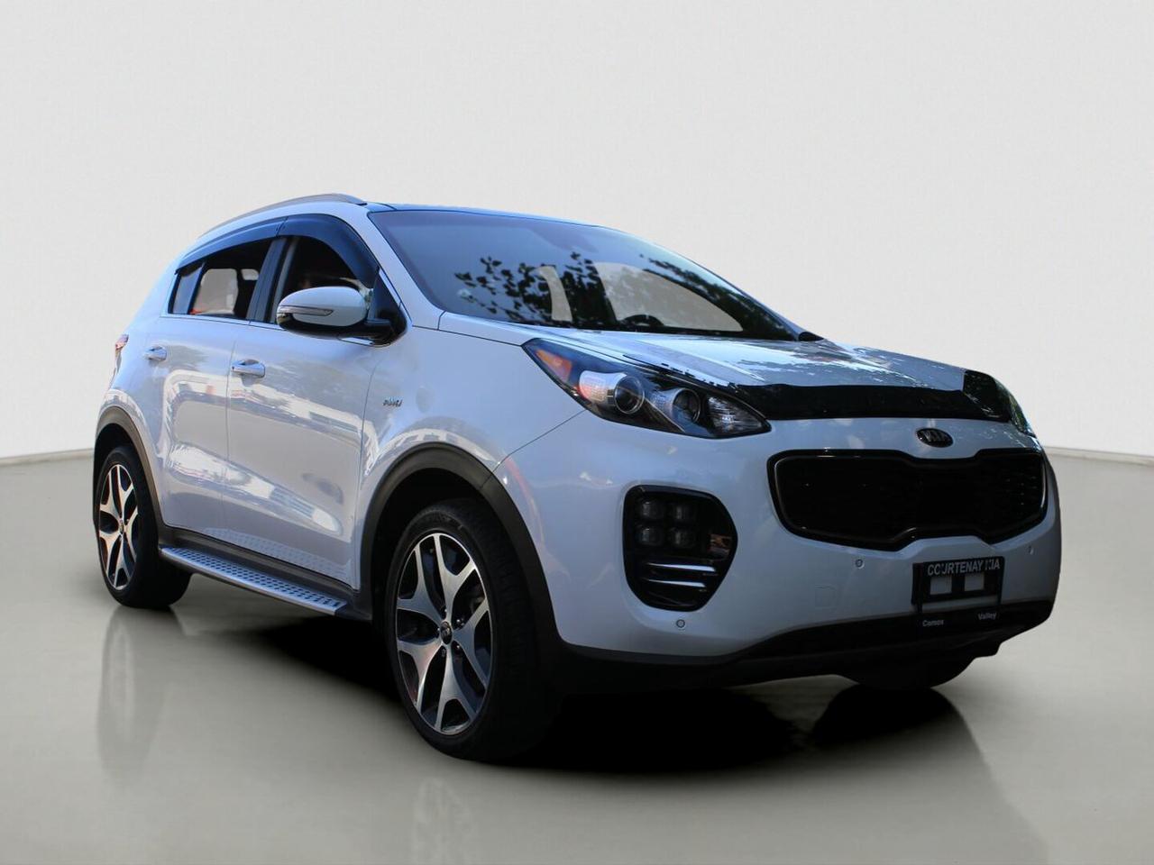 The 2017 Kia Sportage AWD 4dr SX Turbo w/Black offers turbo power, all-wheel drive confidence, and upscale comfort in one well-equipped compact SUV. Finished in White with a Beige interior, this accident-free example has only 47,028 km. CARFAX Canada reports no accident, giving you added peace of mind at Courtenay Kia.

FEATURES OF THE Sportage AWD 4dr SX Turbo w/Black
»» Turbocharged 2.0-litre engine delivers lively response
»» All-wheel drive adds year-round traction
»» Panoramic sunroof brightens the cabin
»» Power liftgate supports easy daily loading

ADVANCED SAFETY FEATURES
»» Backup camera helps with reversing visibility
»» Blind spot monitor supports safer lane changes
»» Anti-lock braking system improves control
»» Side and head airbags add protection

The 2017 Kia Sportage AWD 4dr SX Turbo w/Black is built for drivers who want confidence in changing road conditions. Its safety equipment helps support everyday commuting, family travel, and parking in tighter spaces around town.

PERFORMANCE AND EFFICIENCY
»» 2.0-litre turbo engine feels strong and smooth
»» Six-speed automatic transmission shifts confidently
»» Dual shift mode adds driver control
»» All-wheel drive enhances grip on roads

The 2017 Kia Sportage AWD 4dr SX Turbo w/Black balances responsive performance with practical utility. The turbocharged engine gives this SUV quick passing power, while the automatic transmission keeps daily driving easy and refined.

COMFORT AND CONVENIENCE
»» Dual-zone climate control keeps comfort balanced
»» Heated front and rear seats add warmth
»» Driver power seat includes lumbar support
»» Push button start adds everyday ease

Inside, the 2017 Kia Sportage AWD 4dr SX Turbo w/Black feels welcoming and thoughtfully equipped. A panoramic sunroof, front air conditioning, power windows, and adjustable steering wheel help create a cabin that suits both short errands and longer drives.

TECHNOLOGY AND CONNECTIVITY
»» Navigation system helps guide every trip
»» Bluetooth integration supports hands-free calling
»» Steering wheel audio controls feel convenient
»» Satellite radio expands listening choices

The 2017 Kia Sportage AWD 4dr SX Turbo w/Black also brings useful tech to your drive. HD Radio, automatic headlights, and an auto-dimming rearview mirror help make each trip more convenient, whether you are commuting through Courtenay or heading out of town.

CARGO SPACE
»» Power liftgate makes loading more convenient
»» Rear trunk access simplifies daily use
»» Cargo cover keeps items out of sight
»» Four-door layout supports passenger flexibility

The 2017 Kia Sportage AWD 4dr SX Turbo w/Black offers practical space for groceries, travel bags, and daily gear. Its SUV design gives you flexible room, while the rear spoiler and tinted windows add a sporty, polished look.

AWARDS & RECOGNITIONS
»» Top Safety Pick, Insurance Institute for Highway Safety, 2017

WHAT OTHER OWNERS LIKE
»» Strong turbo power for confident merging
»» Comfortable ride with useful seat heating
»» Easy-to-use infotainment and navigation features
»» Secure all-wheel drive in poor weather


Come and visit Courtenay Kia and experience our brand new, State-of-the-art Facility where you will find one of North Vancouver Islands largest selection of New and Pre-Owned Vehicles, Friendly and Knowledgeable Sales staff and a team of Finance Professionals that will secure the best finance arrangements, whether you have great credit or not-so-great!

$699.00 Documentation Fee Applies, Taxes Extra

Stock # SP5131A

Dealer # 30891
1025A Comox Road
Courtenay BC V9N 3P7