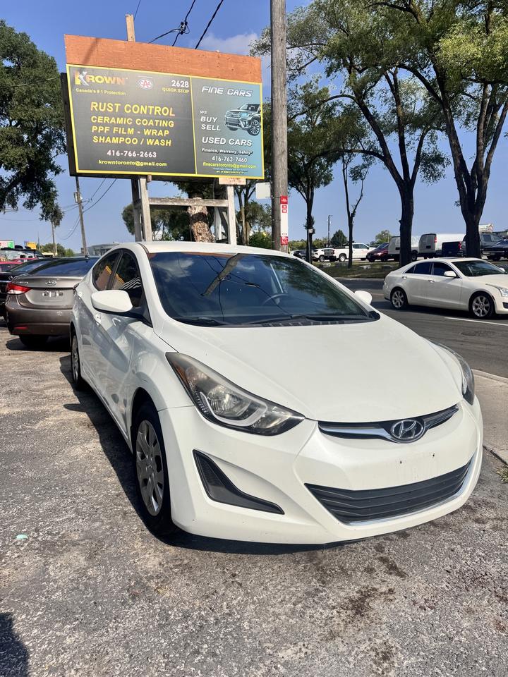 2014 Hyundai Elantra  Style, Efficiency, and Value in One Package! <br/> Looking for a dependable, fuel-efficient compact car with modern features and sleek design? The 2014 Hyundai Elantra checks all the boxes. With its bold styling, comfortable interior, and impressive fuel economy, this Elantra delivers premium value without the premium price tag. <br/> As per OMVIC regulations, we state that this vehicle is not certified and may not be drivable and may require substantial expense at buyers cost to make it road-worthy. We recommend strongly that you consider our optional certification package starting from $695.00 for peace of mind. <br/> We may accept A SERIOUS OFFER, TRY YOURS TODAY!!! <br/> We provide free CARFAX / UCDA reports on all vehicles we sell. <br/> We also offer optional extended mechanical breakdown warranties on select vehicles from 3 months to 3 years at reasonable costs, please ask for details. <br/> Limited time special, FREE Krown Rust treatment is included at our list advertised price only with purchase of safety certification package. Ask for details. All warranties are 20% off. <br/> HST AND LICENSING FEES ARE NOT INCLUDED IN THE PRICE <br/> NO ADMINISTRATION FEES! NO HIDDEN FEES! <br/> FINANCE AVAILABLE O.A.C. <br/> BUY WITH CONFIDENCE <br/> BUY FROM AN ONTARIO REGISTERED DEALER <br/> We are a Proud Member of OMVIC and UCDA since 2001 <br/> Monday to Friday 10am - 5pm. , Saturday 10am - 2 pm. Sunday Closed. <br/> PLEASE CALL 416-763-7460 for later appointments <br/> COME ENJOY OUR HASSLE FREE CAR BUYING EXPERIENCE. NO SALESPERSON FORCING YOU TO BUY. DEAL DIRECT WITH OWNER. FIND OUT WHY WE EXCEL AS A SMALL DEALER WITH 100% satisfaction record! Serving GTA for over 20 years. We are also CAA APPROVED KROWN Rust Center now in our 39th year! <br/> SERVING GTA, TORONTO, OTTAWA, MISSISSAUGA, BRAMPTON, SCARBOROUGH, AJAX, BARRIE, HAMILTON, RICHMOND HILL, WHITBY, OSHAWA, OAKVILLE AND BURLINGTON.Please contact the seller to reconfirm pricing, features, odometer, and availability of this vehicle. <br/>
