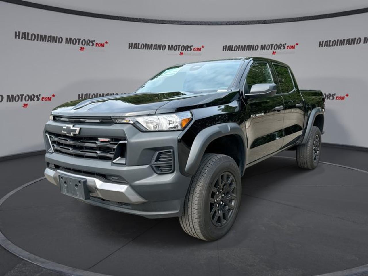 // ACCIDENT FREE!! //<br /><br />This 2024 Chevrolet Colorado 4wd Crew Cab Trail is a smart pick for drivers who want modern truck capability in a clean, confident package. Finished in Black with four doors and an automatic transmission, this used pickup offers a strong road presence and practical everyday use from Haldimand Motors Ltd. in Cayuga.<br /><br />With 57,342 km on the odometer, this Chevrolet Colorado 4wd Crew Cab Trail has already proven its value while still feeling fresh for work, travel, and daily driving. Its accident-free history and single-owner background add real peace of mind for buyers who want a well-kept truck with a clear story.<br /><br />FEATURES OF THE Colorado 4wd Crew Cab Trail<br />   Black exterior with bold truck presence<br />   Four full doors for easy access<br />   Automatic transmission for smooth daily driving<br />   Crew Cab layout adds passenger practicality<br /><br />TRUCK FEATURES<br />   Mid-size pickup built for daily versatility<br />   Crew Cab adds useful rear passenger room<br />   Pickup box supports gear and cargo<br />   Strong truck stance inspires driving confidence<br /><br />ADVANCED SAFETY FEATURES<br />   Rear vision support helps with parking<br />   Strong body structure supports occupant protection<br />   Four-door design helps family-friendly daily use<br />   Modern truck engineering supports driver confidence<br /><br />PERFORMANCE AND EFFICIENCY<br />   Automatic transmission delivers smooth power response<br />   Gas engine supports dependable everyday driving<br />   Mid-size design balances strength and manoeuvrability<br />   Well suited for highway and city travel<br /><br />COMFORT AND CONVENIENCE<br />   Crew Cab offers roomy passenger access<br />   Four doors make loading easier<br />   Practical cabin layout supports daily comfort<br />   Easy step-in height for regular use<br /><br />TECHNONOLGY AND CONNECTIVITY<br />   Driver-focused controls support simple operation<br />   Clear instrument layout aids quick checks<br />   Modern cabin design feels current and functional<br />   Easy access controls improve daily usability<br /><br />CARGO SPACE<br />   Pickup bed handles tools and supplies<br />   Open box simplifies larger item loading<br />   Cabin storage helps organize essentials<br />   Rear seating area adds extra flexibility<br /><br />AWARDS & RECOGNITIONS<br />   2024 North American Truck of the Year finalist<br /><br />WHAT OTHER OWNERS LIKE<br />   Easy size for daily truck driving<br />   Crew Cab comfort for family travel<br />   Useful bed for work and hobbies<br />   Smooth automatic operation in traffic<br /><br />The 2024 Chevrolet Colorado 4wd Crew Cab Trail stands out by keeping things simple in the best way. It gives you the everyday usefulness of a pickup without the bulk of a full-size truck. That makes it easier to park, easier to handle in town, and still ready for weekend projects.<br /><br />The black finish gives this truck a clean and confident look that suits both business and personal use. A four-door body style also makes a real difference, giving rear passengers easier access and making it simpler to load bags, gear, or work items inside the cabin when needed.<br /><br />Inside, the Crew Cab design adds flexibility that many drivers want from a modern pickup. Whether you are carrying passengers through the week or using the rear area for extra storage, this layout helps the truck adapt to changing needs without fuss.<br /><br />The automatic transmission adds to the Colorados appeal by making every trip smoother and more relaxed. It is a great match for commuting, highway driving, and stop-and-go traffic. Combined with a gas engine, it delivers the familiar performance many truck shoppers still prefer.<br /><br />For buyers who value history, condition, and practical use, this accident-free, single-owner truck checks important boxes. It is a capable and versatile Chevrolet pickup with the style, layout, and everyday function that make ownership easy. Visit Haldimand Motors Ltd. in Cayuga to see what this 2024 Chevrolet Colorado 4wd Crew Cab Trail can do for you.<br /><br />This 2024 Chevrolet Colorado 4wd Crew Cab Trails VIN is: 1GCPTEEK2R1133430 .<br /><br />WHY CHOOSE US? <br /><br />Honest & Transparent Buying Experience: Weve been a trusted name in business since 1984.<br /><br />STRAIGHTFORWARD PRICING:<br />Our Advertised Price Includes:<br />>>Safety Certification (No separate fee!)<br />>>30-Day 100% Mechanical Warranty<br />>>FREE Carfax History Report.<br />>>No upcharge for paying cash.<br />(Prices Exclude HST and Licensing Fees only.)<br /><br />>>Browse 300+ vehicles all in ONE LOCATION<br /><br />EASY FINANCING: Great rates & open loans<br /><br />WE BUY CARS: Get Top Dollar for your trade-in, or sell us your vehicle for CASH! Even if you dont buy from us!<br /><br />STOP BY TODAY<br />Treat yourself - stop by Haldimand Motors Ltd. located at 42 Talbot St E, Cayuga, ON N0A 1E0 to make this car yours today!<br /><br />https://www.haldimandmotors.com/used/stock-460908.html