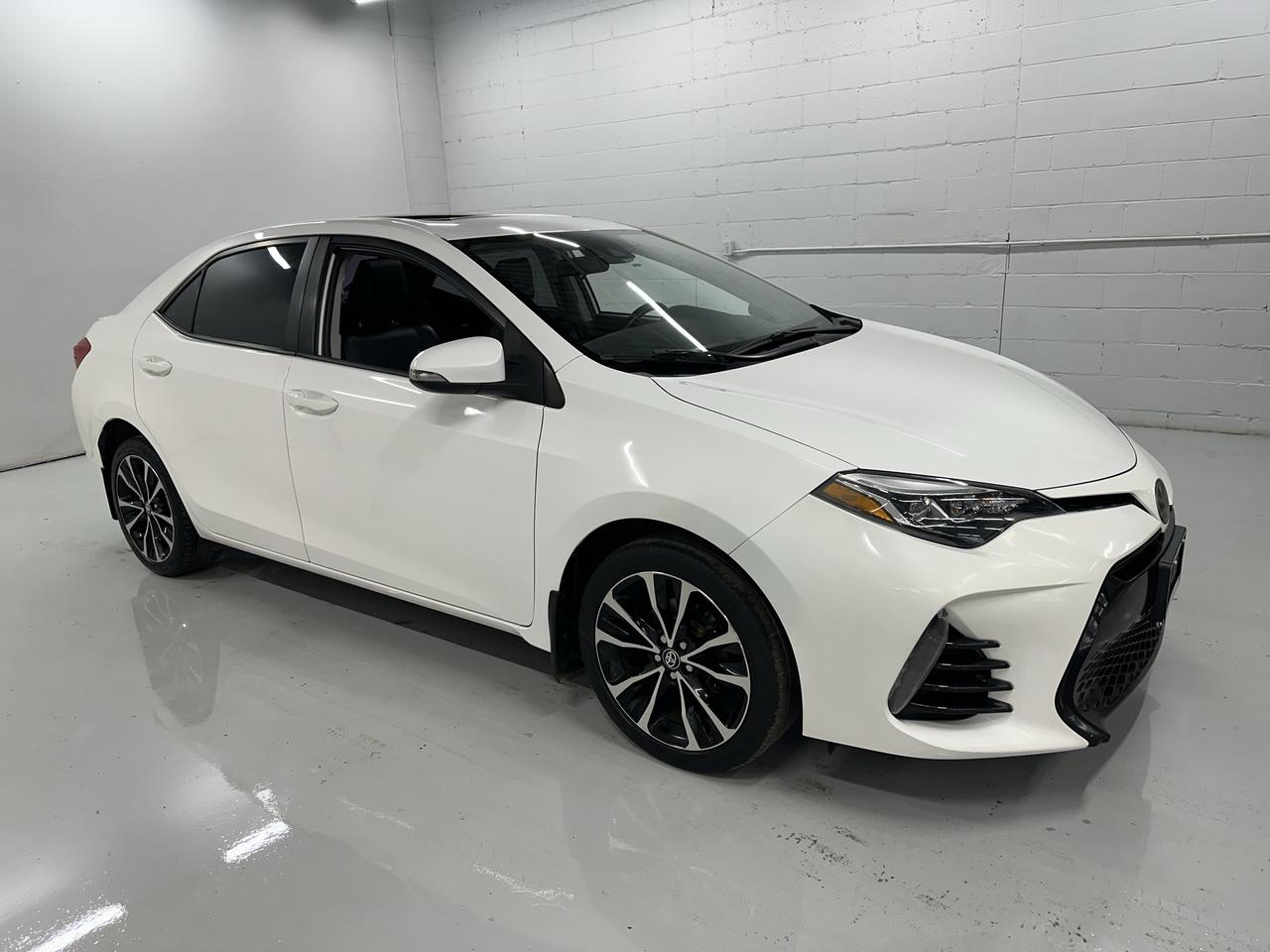 <p>Looking for a reliable and stylish ride that wont break the bank? Troys Toys has a fantastic 2017 Toyota Corolla SE thats ready to hit the road with you! This sporty sedan boasts a sleek white exterior thats sure to turn heads, perfectly complemented by a comfortable black interior. Its powered by an efficient 1.8L I4 engine paired with a smooth Variable/CVT transmission, offering a responsive and enjoyable driving experience. With its practical four-door design and front-wheel drive, this Corolla is ideal for everything from daily commutes to weekend adventures. Its currently showing 175,465 kilometers on the odometer, a testament to its proven durability.</p><p>This 2017 Toyota Corolla SE is more than just a car; its a smart investment in your daily life. Youll appreciate the fuel efficiency and the legendary reliability that Toyota is known for, making this a worry-free choice for the long haul. Whether youre navigating city streets or cruising on the highway, youll feel confident and in control.</p><p>Here are 5 sizzling features that make this 2017 Toyota Corolla SE stand out at Troys Toys:</p><ul><li><strong>Sporty SE Trim:</strong> Elevate your driving experience with the SE trim, designed for a more dynamic feel and sharper aesthetics.</li><li><strong>Fuel-Efficient 1.8L I4 Engine:</strong> Enjoy impressive gas mileage that keeps your wallet happy mile after mile.</li><li><strong>Smooth Variable Transmission (CVT):</strong> Experience seamless acceleration and an incredibly fluid ride.</li><li><strong>Sleek White Exterior:</strong> Make a statement with a timeless and eye-catching white finish.</li><li><strong>Comfortable Black Interior:</strong> Settle into a refined and practical cabin designed for everyday comfort.</li></ul><p><strong><em>Powered by AutoIntelligence&trade;</em></strong></p><p>Vehicle information has been generated using artificial intelligence and is provided for informational purposes only. While efforts are made to ensure accuracy, please confirm all details directly with the dealer.</p>