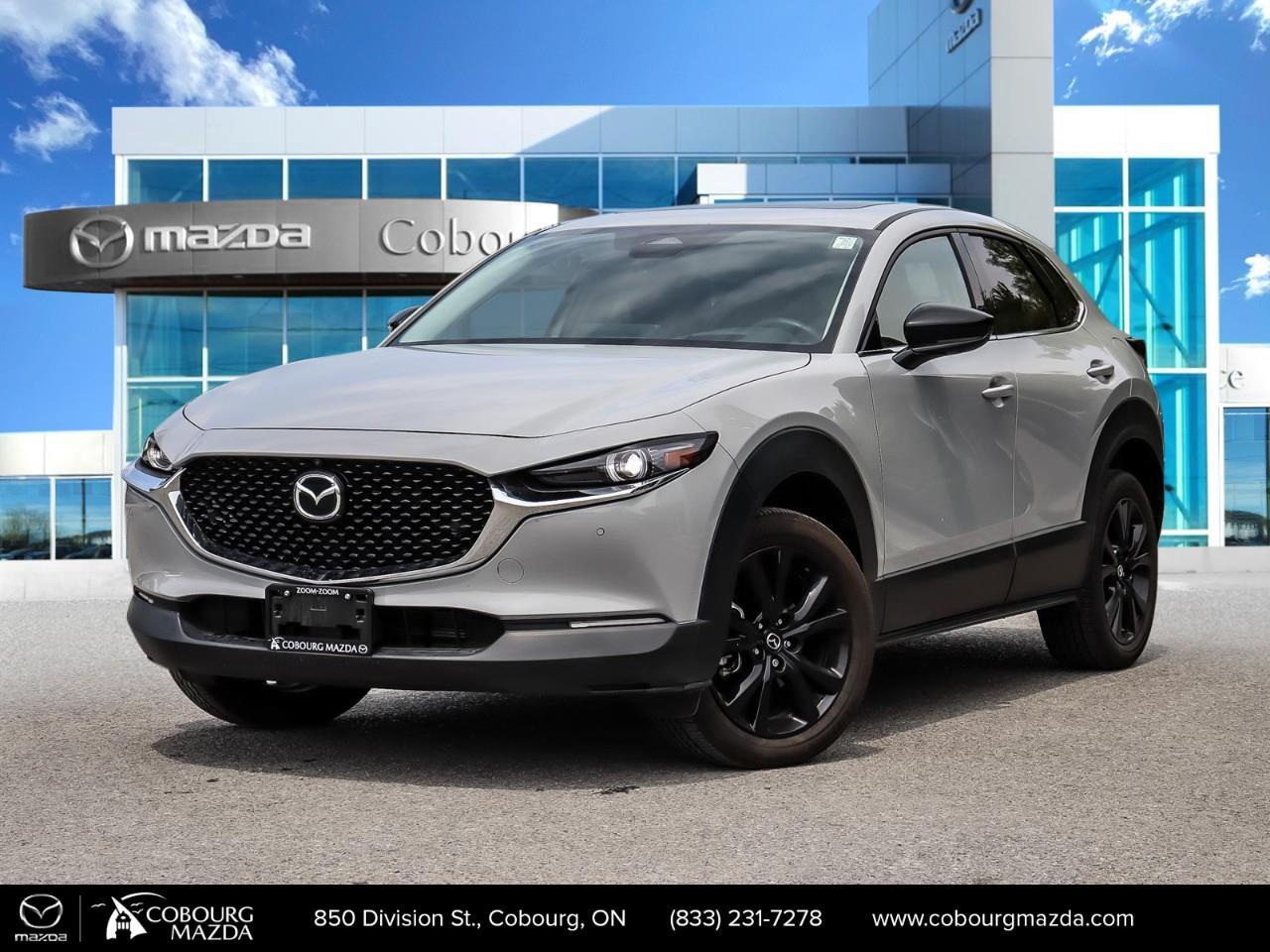 <p>Introducing the stylish 2025 Mazda CX-30 GT AWD in sleek gray, perfectly equipped to handle diverse Canadian terrains with its all-wheel drive and responsive handling. This compact SUV offers both practicality and style, making it an ideal choice for urban dwellers and outdoor enthusiasts alike.</p><p>The eye-catching exterior is matched by a luxurious red interior, featuring premium leather seats and a leather-wrapped steering wheel that add a touch of elegance to every drive. Enjoy the convenience of keyless entry, power seats, and power windows, all while soaking up the sun through the sunroof.</p><p>Stay connected and safe on the road with a host of modern technological features including smart device integration, navigation system, and a vivid heads up display. Safety and driver assistance are a top priority with features like adaptive cruise control, lane assist, brake assist, and parking sensors, ensuring a secure driving experience.</p><p>Perfect for tech-savvy families and individuals looking for comfort and assurance, the Mazda CX-30 GT AWD delivers everything you need. Whether you're commuting to work or embarking on a weekend getaway, contact Cobourg Mazda today to learn more about this impressive vehicle and book a test drive.</p>