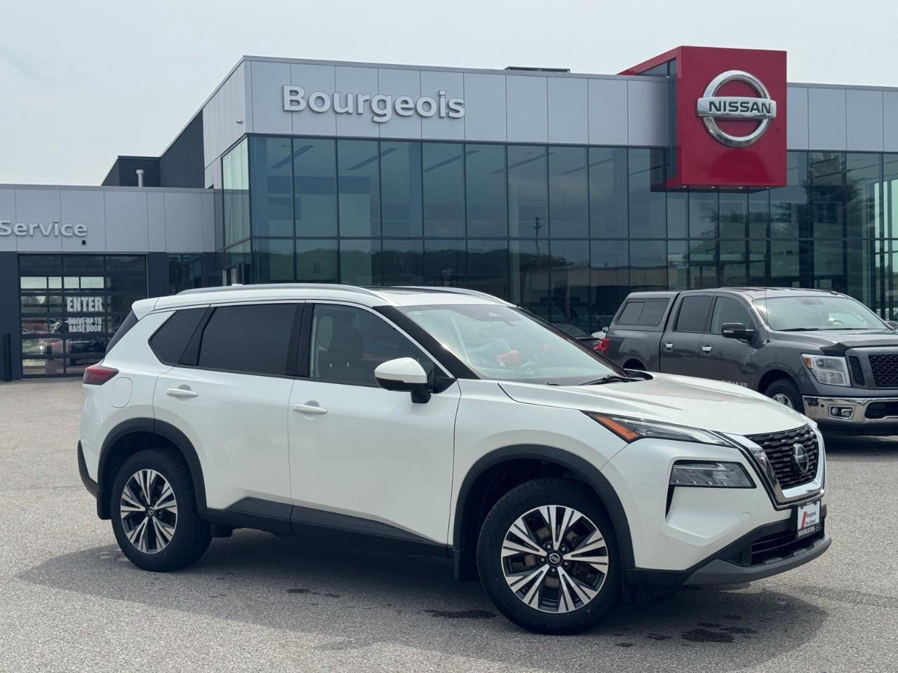 <p>Say hello to the 2021 Nissan Rogue SV in a pristine white exterior paired with a sophisticated gray interior, featuring an advanced AWD drivetrain perfect for tackling Canadian roads with confidence and ease.</p> <p>This SUV showcases a striking appearance with its modern design and alloy wheels. Inside, you are greeted by a spacious and elegant cabin, complete with heated seats and power adjustable options for optimal comfort, along with a panoramic sunroof that fills the space with natural light.</p> <p>The Rogue SV is loaded with cutting-edge technology to enhance your driving experience, such as smart device integration, a Bluetooth connection, and a Wi-Fi hotspot, ensuring you stay connected wherever you go. Safety is paramount with features like lane assist, a backup camera, brake assist, and cruise control that support a secure and relaxed drive.</p> <p>Families and adventurers alike will appreciate the convenience of keyless entry, remote start, and ample cargo space. If you're seeking a versatile vehicle that blends style, technology, and safety, look no further. Contact Bourgeois Midland Nissan today to learn more about how the Nissan Rogue SV can become your perfect travel companion.</p> <p><strong>Why Choose the Bourgeois Auto Group?</strong></p><p>For 80 years, Bourgeois Auto Group has been delivering exceptional automotive experiences. Our factor trained teams work to ensure you receive the shopping experience you deserve; whether you're looking for a new or new-to-you vehicle.</p><p>Shop 24/7 with our online showroom and chat service, ensuring convenience every step of the way. No hidden fees, full disclosure, and every pre-owned vehicle comes with a Carfax® report for peace of mind.</p><p>We offer a wide selection of pre-owned vehicles, all competitively priced using real-time market data. Get the best deal on your purchase and trade-in with our free Live Market Analysis report.</p><p>Looking to sell your car? We buy any make or modelno purchase required. Our simple to use online trade valuation tool will provide you with a clear, transparent selling experience whether you buy our car or not.</p><p>Backed by hundreds dedicated employees across 4 convenient locations, were here to meet all your automotive needs. Visit us in Midland or Parry Sound and explore our inventory or schedule your next service today.</p> <p><strong>Financing Your Next Vehicle with Bourgeois Midland Nissan:</strong></p><p>At Bourgeois Midland Nissan, we make financing your next vehicle simple and stress-free! Our team works with trusted lenders to find flexible options tailored to your budget. Drive away with confidenceapply today!</p><p>Take advantage of our online pre-qualification tool, backed by Equifax and TD Bank to find the payment that works for you. Simply <a href=https://www.bourgeoisnissan.com/pre-qualify-for-financing/ rel=nofollow><strong>CLICK HERE</strong></a> to use our secure online credit tool with no impact to your credit.</p>