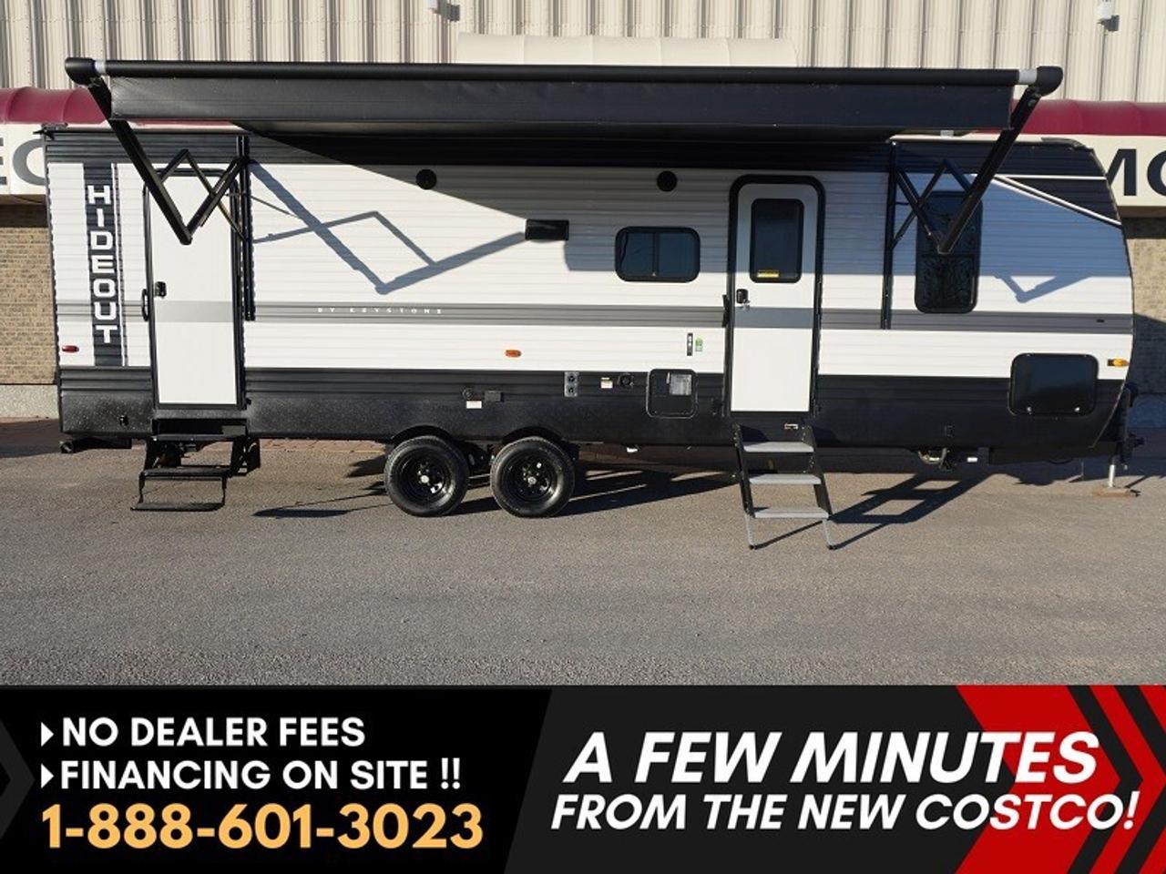 *** Dealer arranged financing on site! Quick, Simple,  no calls or waiting on bank appointments required!! ***   NO ADMINISTRATION FEES!!

Fully redesigned 2022 Keystone RV Hideout 272BH - - Double entry - - Double rear bunks - - Private master bedroom w/Queen-size bed - - Bluetooth stereo - - Indoor/Outdoor speakers - - 16ft Power awning - - Power tongue jack - - Power stabilizer jacks - - SolarFlex200 Charging System - - Walkable roof - - Stainless steel appliances - - Outdoor Shower - -  Full-size bathroom with direct access from outside. 

Very clean solid fiberglass exterior. Fully walkable with highly durable Alpha SuperFlex roof membrane. Lots of storage. The interior is in great condition, modern and spacious. The large slide-out provides an open living and dining area. Fully equipped kitchen. Stainless steel appliances and a double sink. 

Extremely popular bunkhouse design. Perfect for large families. Convenient two-door design with direct access from outside to the bathroom. Spacious yet lightweight.  Half Ton Towable. Perfect for short trips or for seasonal use.

FEATURES

- LCI Solid Step Lift and Level
- Entry Assist Grab Handle
- Tinted Safety Glass
- Blackout Night Shades
- Central Vacuum System
- Dinette Cabinet Doors
- Seamless Countertops
- Double Sink
- 12v 10cf Refrigerator
- Stove with Oven
- Glass Stove Cover
- Microwave
- Systems Center
- USB Charge Station
- Backup and Side Camera Prep
- 4G LTE and WiFi Prep
- Queen Bed
- Overbed Storage
- Nightstands
- Wardrobes
- Laundry Chute
- Underbed Storage Struts
- Bedroom TV Hook-up
- Bedside Outlets
- Bunk Beds (vbm)
- Bunk Ladder
- Privacy Curtain
- Medicine Cabinet Mirror
- Vanity Sink
- Linen Storage
- Foot Flush Toilet
- Entry from outside 
- Steel I-Beam Chassis
- Fiberglass Exterior
- Walkable Roof
- Power Tongue Jack
- Power Stabilizer Jacks
- Power Patio Awning
- Outdoor Speakers 


***EXTENDED WARRANTY options available to choose from to protect your RV and your wallet. (HUGE VALUE!!!) Zero down financing OAC with very Low monthly payments avail. Please see dealer for details. Trades accepted. View at Winnipeg West Automotive Group, 5195 Portage Ave. Dealer permit # 4365, Call now 1-(888) 601-3023.