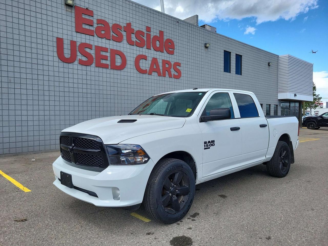 This <i>previously enjoyed</i> <b>2022 Ram 1500 Classic</b> is part of Rams 4WD Standard Pickup Trucks segment and a very nice ride! It has a 6 cylinder engine and&nbspAutomatic transmission. This&nbsp1500 Classic came into our Pre-Owned inventory with <b> 87992</b> kilometers and in good condition. The color is a nice <b>Bright White</b> and aside from the wear and tear of a previously enjoyed vehicle, it is a very nice <b>1500 Classic</b>!!

 Dont forget to explore the options tab for more details. If youre satisfied with what youve learned thus far, kindly fill out one of the forms on this page. One of our proficient and extensively trained sales representatives will provide you with a product demonstration, a personalized video walk-through, and of course, details on pricing and financing options.  

  We know we are not the only Pre-Owned dealer in Calgary, but we pride ourselves on being one of the busiest in town. With over <u><b>150 units in our Pre-Owned inventory</u></b> and being one of Canadas <b>TOP 5</b> Dodge Chrysler Jeep Ram dealers, we are confident that we have exactly what you are looking for! 

   Thank you for considering purchasing this <b> 2022 Ram 1500 ClassicAt Eastside Dodge, we are thrilled to offer you an exceptional experience. We pledge to ensure that it surpasses all your expectations and becomes one of your finest experiences. 




</b>