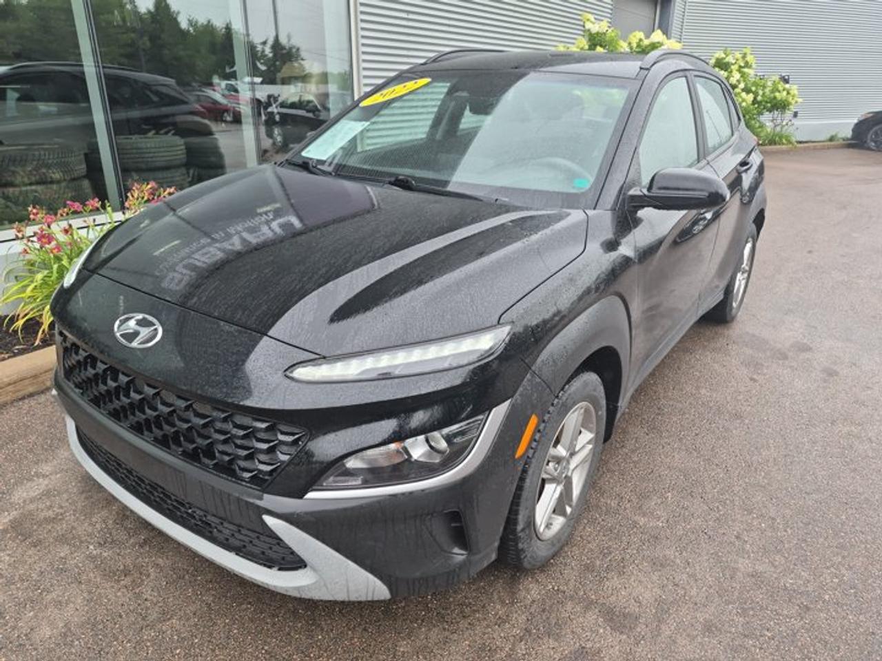 **2022 Hyundai Kona 2.0L Essential AWD | Compact SUV | Heated Seats | Modern Technology**Discover the perfect combination of style, efficiency, and everyday versatility with this **2022 Hyundai Kona 2.0L Essential**. With its bold design, comfortable interior, and available all-wheel-drive capability, the Kona is an excellent choice for commuters, first-time SUV buyers, and anyone looking for a practical vehicle with plenty of personality.Powered by a reliable 2.0L 4-cylinder engine paired with a smooth automatic transmission, the Kona delivers confident performance, excellent fuel economy, and easy maneuverability for both city driving and highway cruising. Available All-Wheel Drive provides added confidence when road conditions change.Inside, youll find a comfortable and well-designed cabin featuring heated front seats, a heated steering wheel, touchscreen infotainment system with Apple CarPlay® and Android Auto , Bluetooth® connectivity, and a rearview camera. The versatile cargo area and split-folding rear seats make the Kona ready for everyday errands and weekend adventures.Hyundai SmartSense safety technology helps provide added confidence with advanced driver assistance features designed to keep you aware and protected on the road.**Key Features:*** 2.0L 4-cylinder engine* Automatic transmission* Available All-Wheel Drive* Heated front seats* Heated steering wheel* Apple CarPlay® & Android Auto* Touchscreen infotainment system* Bluetooth® hands-free calling and audio streaming* Rearview camera* Forward Collision Avoidance Assist* Lane Keeping Assist* Blind-Spot Collision Warning* Rear Cross-Traffic Alert* Cruise control* Steering wheel-mounted controls* Air conditioning* Split-folding rear seats* Alloy wheels* Keyless entryCombining sporty styling, advanced technology, all-season confidence, and Hyundais excellent value, this **2022 Hyundai Kona 2.0L Essential** is ready for your next drive. Contact us today to schedule your test drive!