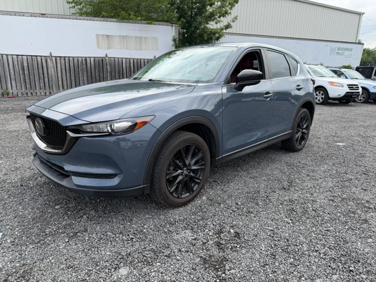 Look at this certified 2021 Mazda CX-5 Kuro AWD | Leather | Sunroof | Heated Wheel + Seats | Radar Cruise | CarPlay + Android Auto & More !. Its Automatic transmission and 2.5 L engine will keep you going. This Mazda CX-5 comes equipped with these options: Sunroof, Radar Cruise, Leather, Heated Steering Wheel, Air Conditioning, Heated Seats, Tilt Steering Wheel, Steering Radio Controls, Power Windows, and Power Locks. Stop by and visit us at Mark Wilsons Better Used Cars, 5055 Whitelaw Road, Guelph, ON N1H 6J4.MASSIVE SELECTION: 500+ vehicles in ONE LOCATION, all Live Market Priced for the best value!STRAIGHTFORWARD & TRANSPARENT PRICING: Our Advertised Price INCLUDES:Safety Certification! (No separate certification fee upcharge).FREE Carfax History Report!NO upcharge for paying cash!CONFIDENCE & PEACE OF MIND: 30-Day/3,000 km Warranty INCLUDED! Plus a 5-Day Exchange Privilege!*EASY FINANCING: Better-than-bank rates, $0 Down, and 3 Months No Payments available OAC. BAD CREDIT APPROVED HERE!WE BUY CARS: Get Top Dollar for your trade, or sell us your vehicle for CASH even if you dont buy ours!www.shopwilsons.comAn Honest, Transparent Buying Experience. Trusted in business since 1961!(Cash Prices Exclude HST and Licensing Fees only.)