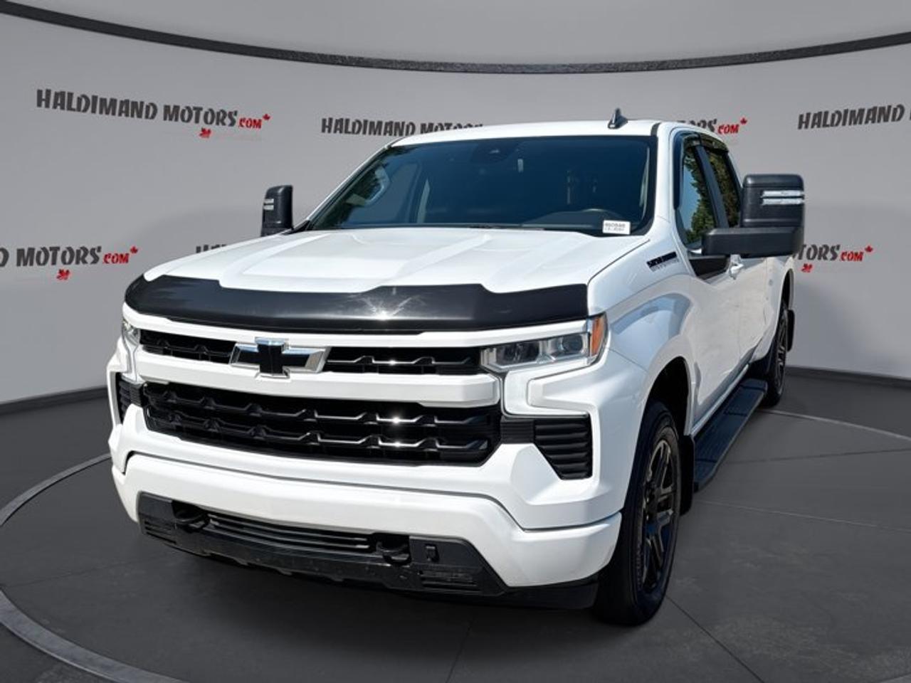 // SINGLE OWNER! //<br /><br />This 2023 Chevrolet Silverado 1500 RST Crew Cab 6.5 Box 4WD is a full-size truck built for hard work and daily comfort. Finished in White with a Black interior, it brings strong V8 power, four full doors, and a long 6.5-foot box for added utility. This used Chevrolet Silverado 1500 RST Crew Cab 6.5 Box 4WD has 135,000 km and offers the confidence of one-owner history.<br /><br />With its 5.3-litre gas engine and 8-speed automatic transmission, this 2023 Chevrolet Silverado 1500 RST Crew Cab 6.5 Box 4WD delivers smooth power for highway travel, jobsite duty, and weekend towing. Four-wheel drive adds extra traction when roads turn rough, while the heated steering wheel and heated front seats help make cold Canadian mornings much easier.<br /><br />FEATURES OF THE Silverado 1500 RST Crew Cab 6.5 Box 4WD | One Owner | Heated Steering<br />   One-owner truck with proven ownership history<br />   Heated steering wheel for cold mornings<br />   Crew Cab with spacious four-door layout<br />   6.5-foot box adds useful cargo room<br /><br />TRUCK FEATURES<br />   Towing capacity rated at 5,986 kg<br />   Trailer hitch ready for hauling duties<br />   Trailer brake controller adds towing confidence<br />   Rear tow hook supports truck utility<br /><br />ADVANCED SAFETY FEATURES<br />   Backup camera helps with reversing visibility<br />   Lane departure warning adds driving awareness<br />   Stability control supports secure road handling<br />   Side and head airbags enhance protection<br /><br />The 2023 Chevrolet Silverado 1500 RST Crew Cab 6.5 Box 4WD is well equipped with the key safety and driver-assist features many truck buyers want most. Anti-lock braking system, tire pressure monitoring, and a passenger airbag sensor all add everyday peace of mind whether you are commuting, towing, or loading up for work.<br /><br />PERFORMANCE AND EFFICIENCY<br />   5.3-litre gas V8 delivers solid power<br />   Eight-speed automatic supports smooth shifting<br />   Four-wheel drive improves traction year-round<br />   Limited slip differential aids slippery starts<br /><br />This 2023 Chevrolet Silverado 1500 RST Crew Cab 6.5 Box 4WD balances strong capability with easy drivability. The power steering helps keep this full-size truck manageable in town, while cruise control makes longer highway trips more relaxed. It is a practical setup for drivers who need real truck strength without giving up comfort.<br /><br />COMFORT AND CONVENIENCE<br />   Heated front seats add winter comfort<br />   Dual-zone climate control helps everyone<br />   Remote starter warms cabin before departure<br />   Power driver seat includes lumbar support<br /><br />Inside, the 2023 Chevrolet Silverado 1500 RST Crew Cab 6.5 Box 4WD is designed for daily use. Front air conditioning, rear air conditioning, and rear climate control help keep passengers comfortable in every season. Power windows, automatic door locks, push button start, and heated mirrors add useful convenience to every drive.<br /><br />TECHNONOLGY AND CONNECTIVITY<br />   Apple CarPlay connects favourite mobile apps<br />   Android Auto adds easy smartphone access<br />   Bluetooth integration supports hands-free calling<br />   WiFi hotspot helps keep devices connected<br /><br />This 2023 Chevrolet Silverado 1500 RST Crew Cab 6.5 Box 4WD also includes steering wheel audio controls, satellite radio, and a clear, practical interface that keeps key functions close at hand. It is a smart truck for drivers who want simple access to media, calls, navigation apps, and connected services on the road.<br /><br />CARGO SPACE<br />   6.5-foot box handles larger loads<br />   Crew Cab adds flexible interior storage<br />   Rear trunk access improves loading ease<br />   Four-door layout supports busy lifestyles<br /><br />The longer box on this 2023 Chevrolet Silverado 1500 RST Crew Cab 6.5 Box 4WD gives it a real advantage for carrying tools, gear, and weekend project supplies. Whether you are packing for work or recreation, this truck offers the space and flexibility expected from a capable Chevrolet pickup.<br /><br />AWARDS & RECOGNITIONS<br />   Best Buy Award, The Car Guide, 2023<br />   Best Full-Size Pickup, Auto123, 2023<br /><br />WHAT OTHER OWNERS LIKE<br />   Strong V8 power for towing confidence<br />   Spacious Crew Cab for family use<br />   User-friendly infotainment with smartphone integration<br />   Comfortable ride for an everyday truck<br /><br />This 2023 Chevrolet Silverado 1500 RST Crew Cab 6.5 Box 4WD is a smart choice for drivers who want proven ownership history, strong towing ability, winter-ready comfort, and practical technology. Available at Haldimand Motors Ltd. in Cayuga, this White Chevrolet pickup is ready to handle work, travel, and daily life with confidence.<br /><br />This 2023 Chevrolet Silverado 1500 RST Crew Cab 6.5 Box 4WD | One Owner | Heated Steerings VIN is: 3GCUDEED0PG354847 .<br /><br />WHY CHOOSE US? <br /><br />Honest & Transparent Buying Experience: Weve been a trusted name in business since 1984.<br /><br />STRAIGHTFORWARD PRICING:<br />Our Advertised Price Includes:<br />>>Safety Certification (No separate fee!)<br />>>30-Day 100% Mechanical Warranty<br />>>FREE Carfax History Report.<br />>>No upcharge for paying cash.<br />(Prices Exclude HST and Licensing Fees only.)<br /><br />>>Browse 300+ vehicles all in ONE LOCATION<br /><br />EASY FINANCING: Great rates & open loans<br /><br />WE BUY CARS: Get Top Dollar for your trade-in, or sell us your vehicle for CASH! Even if you dont buy from us!<br /><br />STOP BY TODAY<br />Treat yourself - stop by Haldimand Motors Ltd. located at 42 Talbot St E, Cayuga, ON N0A 1E0 to make this car yours today!<br /><br />https://www.haldimandmotors.com/used/stock-460848.html