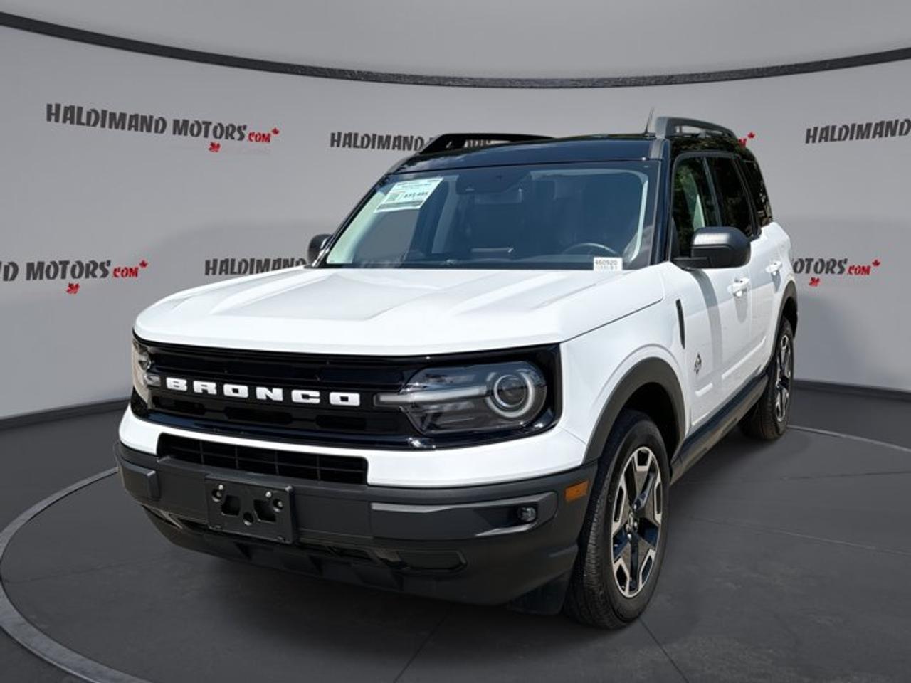 Built for daily comfort and weekend adventure, this used 2024 Ford Bronco Sport Outer Banks 4x4 | Heated Steering Wheel is a smart SUV for drivers who want confidence in every season. Offered by Haldimand Motors Ltd. in Cayuga, it pairs a White exterior with a Brown interior, a 1.5-litre gas engine, automatic transmission, and just 19,705 km.<br /><br />With four doors, four-wheel drive, and a well-equipped cabin, this Bronco Sport Outer Banks 4x4 | Heated Steering Wheel balances easy urban driving with sure-footed traction on rough roads and winter streets. Its raised stance, practical layout, and thoughtful comfort features make it a strong fit for commuting, family use, and active lifestyles alike.<br /><br />FEATURES OF THE Bronco Sport Outer Banks 4x4 | Heated Steering Wheel<br />   Heated steering wheel for cold mornings<br />   Four-wheel drive for year-round confidence<br />   Heated front seats add welcome comfort<br />   LED headlamps improve nighttime visibility<br /><br />ADVANCED SAFETY FEATURES<br />   Backup camera helps with reverse parking<br />   Lane departure warning adds driving support<br />   Blind spot monitor boosts lane awareness<br />   Stability control helps maintain secure handling<br /><br />PERFORMANCE AND EFFICIENCY<br />   1.5-litre gas engine balances power efficiently<br />   Eight-speed automatic supports smooth shifting<br />   Four-wheel drive adds traction on demand<br />   Power steering delivers easy city maneuvers<br /><br />COMFORT AND CONVENIENCE<br />   Heated front seats for winter comfort<br />   Dual-zone climate control keeps peace<br />   Memory seat settings add daily ease<br />   Push button start simplifies every drive<br /><br />TECHNONOLGY AND CONNECTIVITY<br />   Bluetooth integration supports hands-free calling<br />   Satellite radio expands in-car entertainment<br />   Steering wheel audio controls add convenience<br />   Automatic headlights respond to changing light<br /><br />CARGO SPACE<br />   Rear trunk access makes loading easier<br />   Four-door layout helps passenger entry<br />   Spare tire adds roadside reassurance<br />   Flexible SUV shape supports daily gear<br /><br />AWARDS & RECOGNITIONS<br />   Top Safety Pick, Insurance Institute for Highway Safety, 2024<br /><br />WHAT OTHER OWNERS LIKE<br />   Easy-to-use controls for everyday driving<br />   Comfortable ride on city roads<br />   Useful cargo area for active lifestyles<br />   Confident winter traction with four-wheel drive<br /><br />This used 2024 Ford Bronco Sport Outer Banks 4x4 | Heated Steering Wheel stands out with practical features that make each trip easier. Heated mirrors, electric mirrors, power windows, rear window defroster, and fog lights all help when Ontario weather turns rough. Tinted windows, ambient lighting, and an auto-dimming rearview mirror add comfort and a refined feel.<br /><br />Inside, this Bronco Sport Outer Banks 4x4 | Heated Steering Wheel is designed to keep the driver relaxed and in control. You get front air conditioning, automatic climate control, an adjustable steering wheel, drivers seat lumbar support, a power drivers seat, and a power passenger seat. Memory mirrors and memory seating settings help save time when more than one person drives.<br /><br />Safety and peace of mind are supported by a wide list of key features. Anti-Lock Braking System, child safety locks, driver and passenger airbags, side impact airbags, head side airbags, a passenger airbag sensor, tire pressure monitoring, and automatic door locks all work together to support everyday confidence behind the wheel.<br /><br />This 2024 Ford Bronco Sport Outer Banks 4x4 | Heated Steering Wheel also brings the convenience many drivers want most in a modern SUV. Cruise control helps on highway drives, while the backup camera makes parking simpler in tight spots. Heated steering wheel comfort, LED headlamps, and strong overall visibility help make this SUV an easy choice for busy Canadian driving.<br /><br />If you want a compact sport utility vehicle that feels ready for changing seasons, family errands, and weekend escapes, this Ford delivers a very appealing mix. With sharp utility, smart comfort, and trusted capability, this used Bronco Sport is ready for its next owner at Haldimand Motors Ltd. in Cayuga.<br /><br />This 2024 Ford Bronco Sport Outer Banks 4x4 | Heated Steering Wheels VIN is: 3FMCR9C65RRF25183.<br /><br />WHY CHOOSE US? <br /><br />Honest & Transparent Buying Experience: Weve been a trusted name in business since 1984.<br /><br />STRAIGHTFORWARD PRICING:<br />Our Advertised Price Includes:<br />>>Safety Certification (No separate fee!)<br />>>30-Day 100% Mechanical Warranty<br />>>FREE Carfax History Report.<br />>>No upcharge for paying cash.<br />(Prices Exclude HST and Licensing Fees only.)<br /><br />>>Browse 300+ vehicles all in ONE LOCATION<br /><br />EASY FINANCING: Great rates & open loans<br /><br />WE BUY CARS: Get Top Dollar for your trade-in, or sell us your vehicle for CASH! Even if you dont buy from us!<br /><br />STOP BY TODAY<br />Treat yourself - stop by Haldimand Motors Ltd. located at 42 Talbot St E, Cayuga, ON N0A 1E0 to make this car yours today!<br /><br />https://www.haldimandmotors.com/used/stock-460920.html