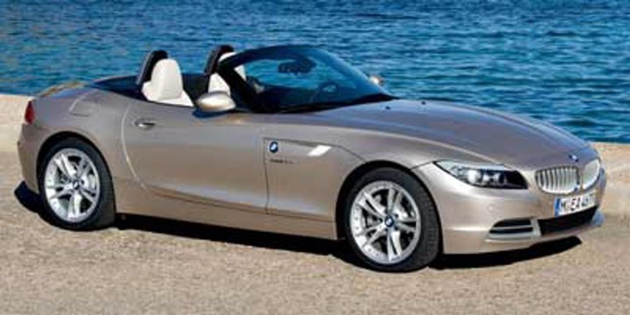 Experience true open-top performance with this stunning 2011 BMW Z4 sDrive35i, a luxury roadster built for drivers who appreciate style, precision, and excitement. Powered by BMWs legendary 3.0L TwinPower Turbo inline-6 engine, this Z4 delivers impressive power, smooth acceleration, and an unforgettable driving experience. The sleek hardtop convertible design combines sporty looks with everyday comfort, while the premium interior offers high-quality materials, supportive seating, and modern conveniences. With rear-wheel drive, sharp handling, and BMWs signature engineering, the Z4 sDrive35i is the perfect blend of luxury and performance ideal for weekend drives, scenic routes, or anyone looking for a true enthusiast vehicle.