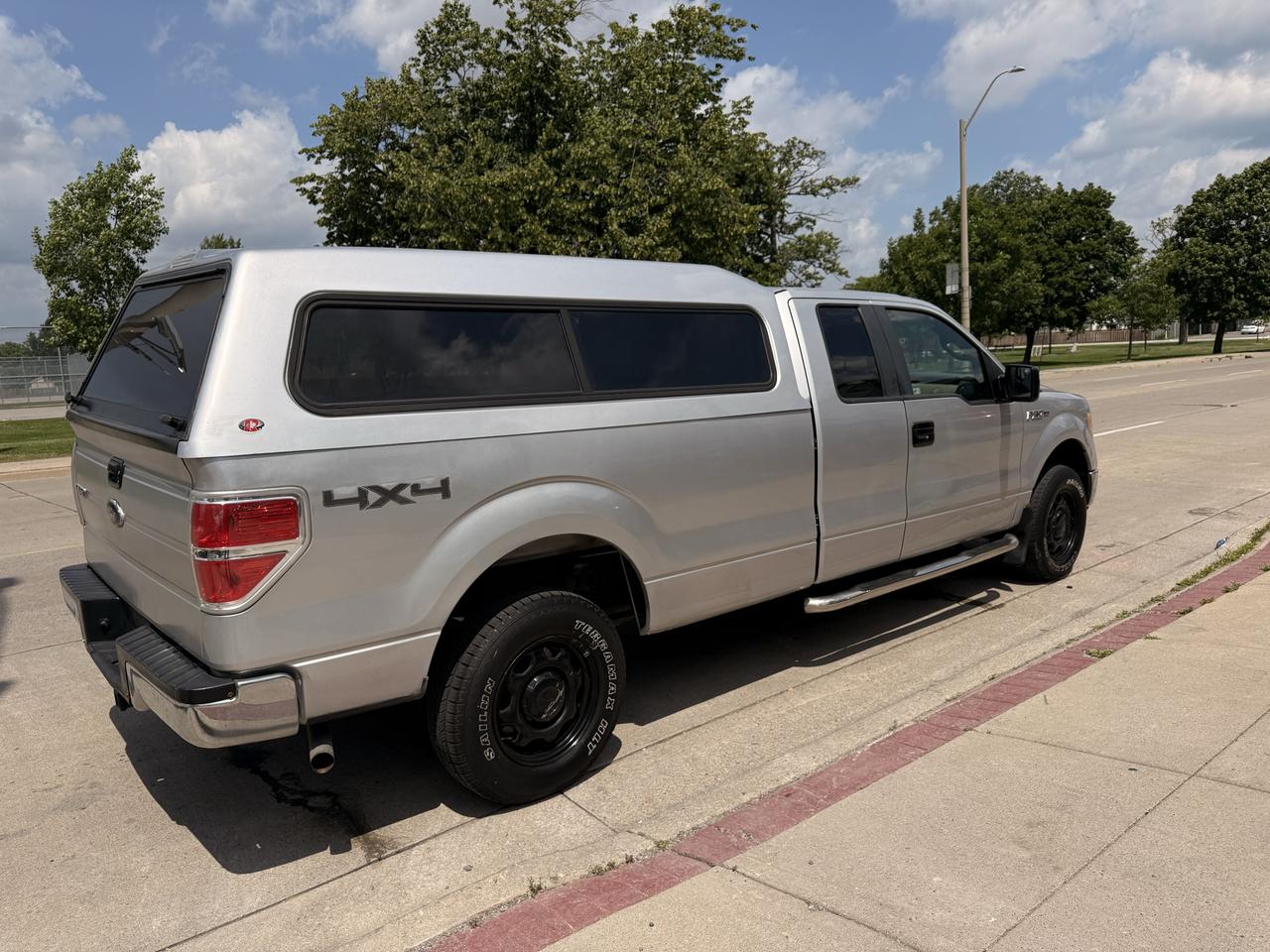 2010 Ford F-150 4WD SUPERCAB 163" XLT Photo