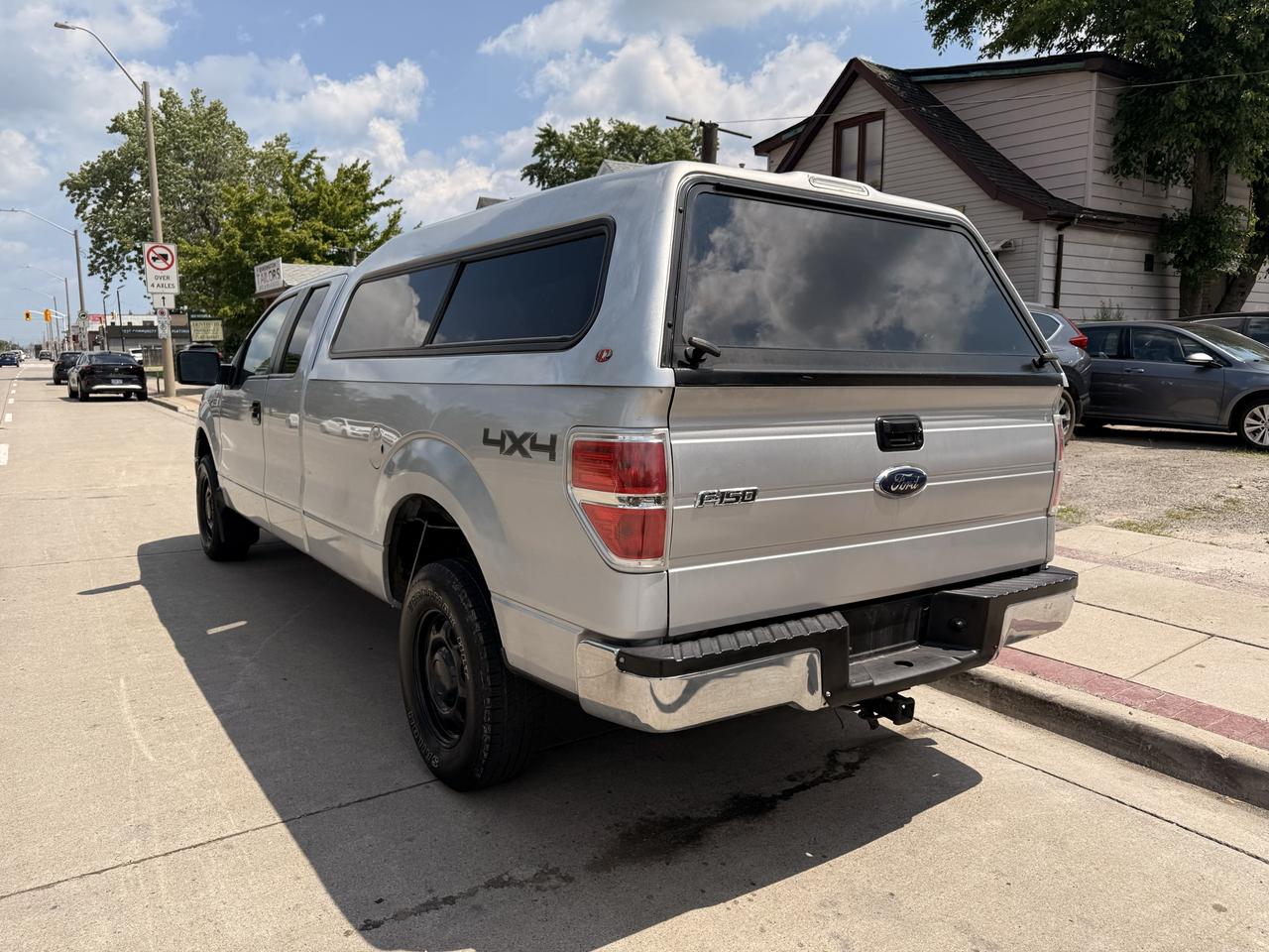 2010 Ford F-150 4WD SUPERCAB 163" XLT Photo