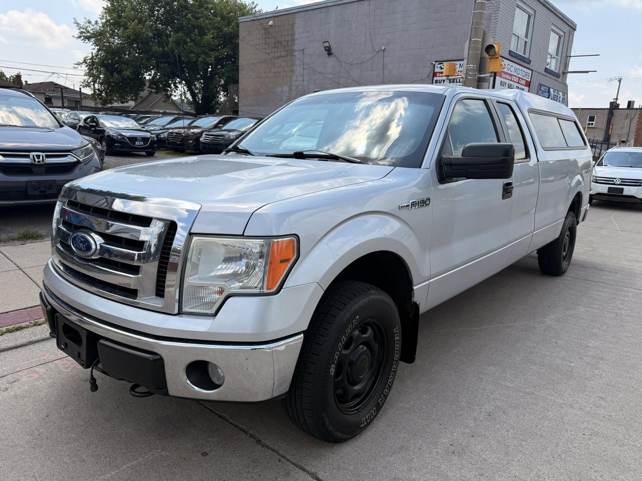 2010 Ford F-150 4WD SUPERCAB 163" XLT Photo