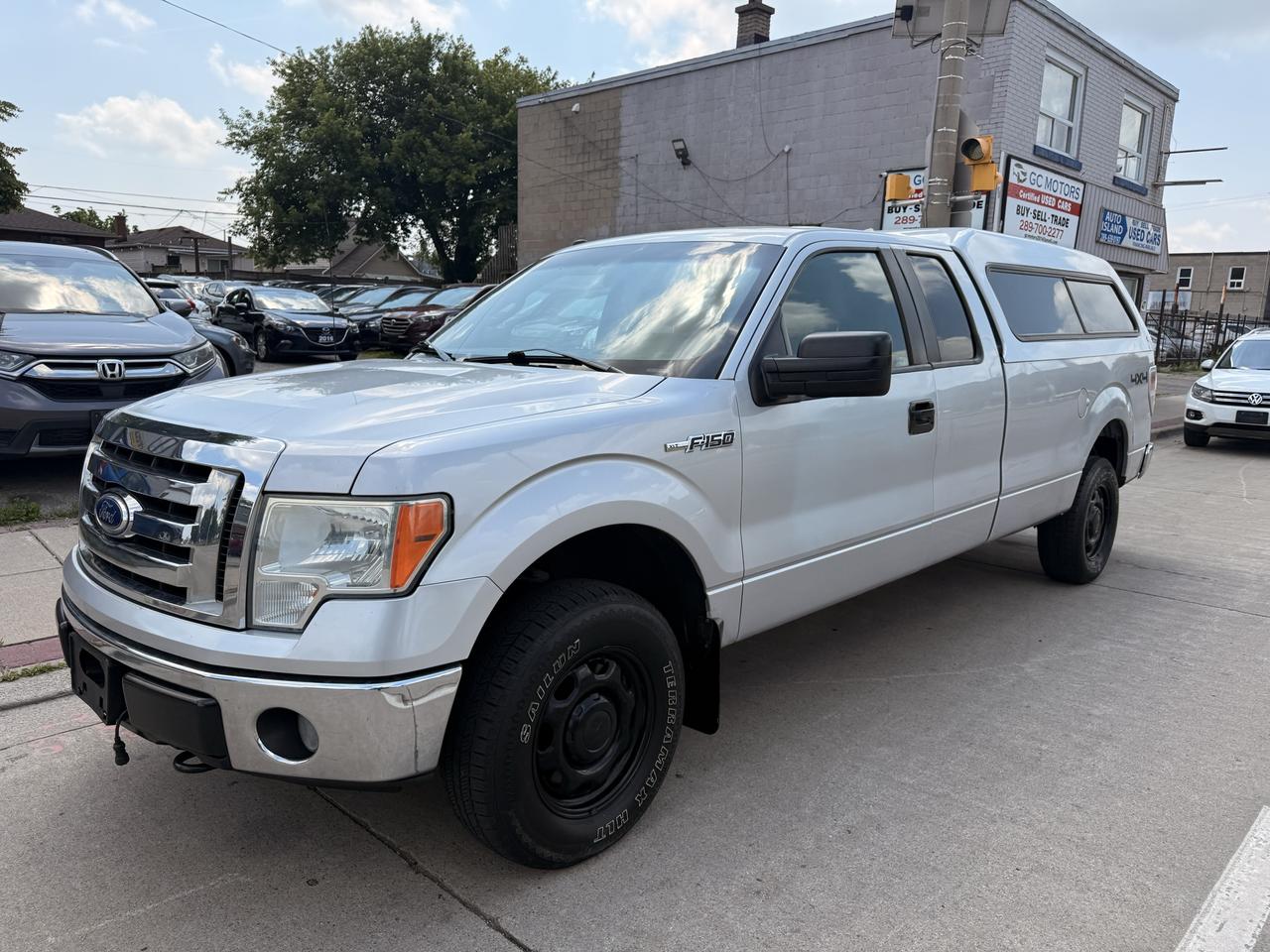 2010 Ford F-150 4WD SUPERCAB 163" XLT Photo