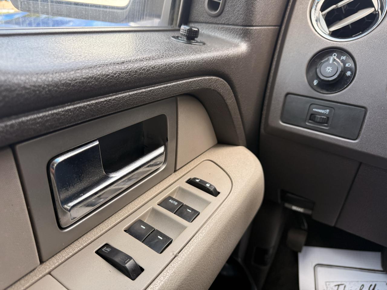 2010 Ford F-150 4WD SUPERCAB 163" XLT Photo