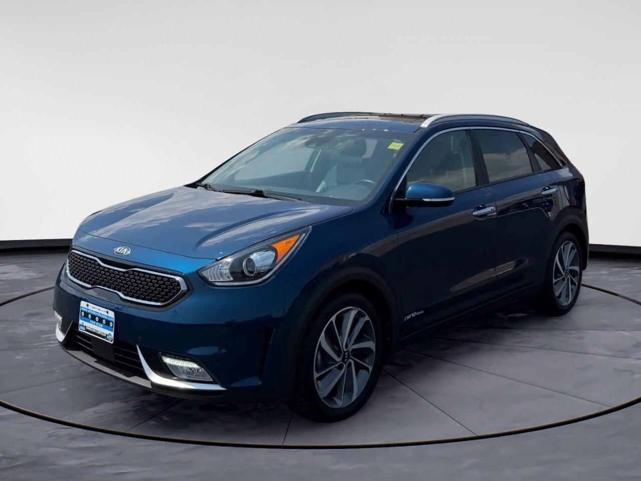 Odometer is 56395 kilometers below market average!

Blue 2019 Kia Niro SX Touring FWD 6-Speed Dual Clutch 1.6L I4 DGI Hybrid DOHC 16V LEV3-SULEV30

**CARPROOF CERTIFIED**, 1.6L I4 DGI Hybrid DOHC 16V LEV3-SULEV30.

* PLEASE SEE OUR MAIN WEBSITE FOR MORE PICTURES AND CARFAX REPORTS * Buy in confidence at WINDSOR CHRYSLER with our 95-point safety inspection by our certified technicians. Searching for your upgrade has never been easier. You will immediately get the low market price based on our market research, which means no more wasted time shopping around for the best price, Its time to drive home the most car for your money today. OVER 100 Pre-Owned Vehicles in Stock! Our Finance Team will secure the Best Interest Rate from one of out 20 Auto Financing Lenders that can get you APPROVED! Financing Available For All Credit Types! Whether you have Great Credit, No Credit, Slow Credit, Bad Credit, Been Bankrupt, On Disability, Or on a Pension, we have options. Looking to just sell your vehicle? We buy all makes and models let us buy your vehicle. Proudly Serving Windsor, Essex, Leamington, Kingsville, Belle River, LaSalle, Amherstburg, Tecumseh, Lakeshore, Strathroy, Stratford, Leamington, Tilbury, Essex, St. Thomas, Waterloo, Wallaceburg, St. Clair Beach, Puce, Riverside, London, Chatham, Kitchener, Guelph, Goderich, Brantford, St. Catherines, Milton, Mississauga, Toronto, Hamilton, Oakville, Barrie, Scarborough, and the GTA.