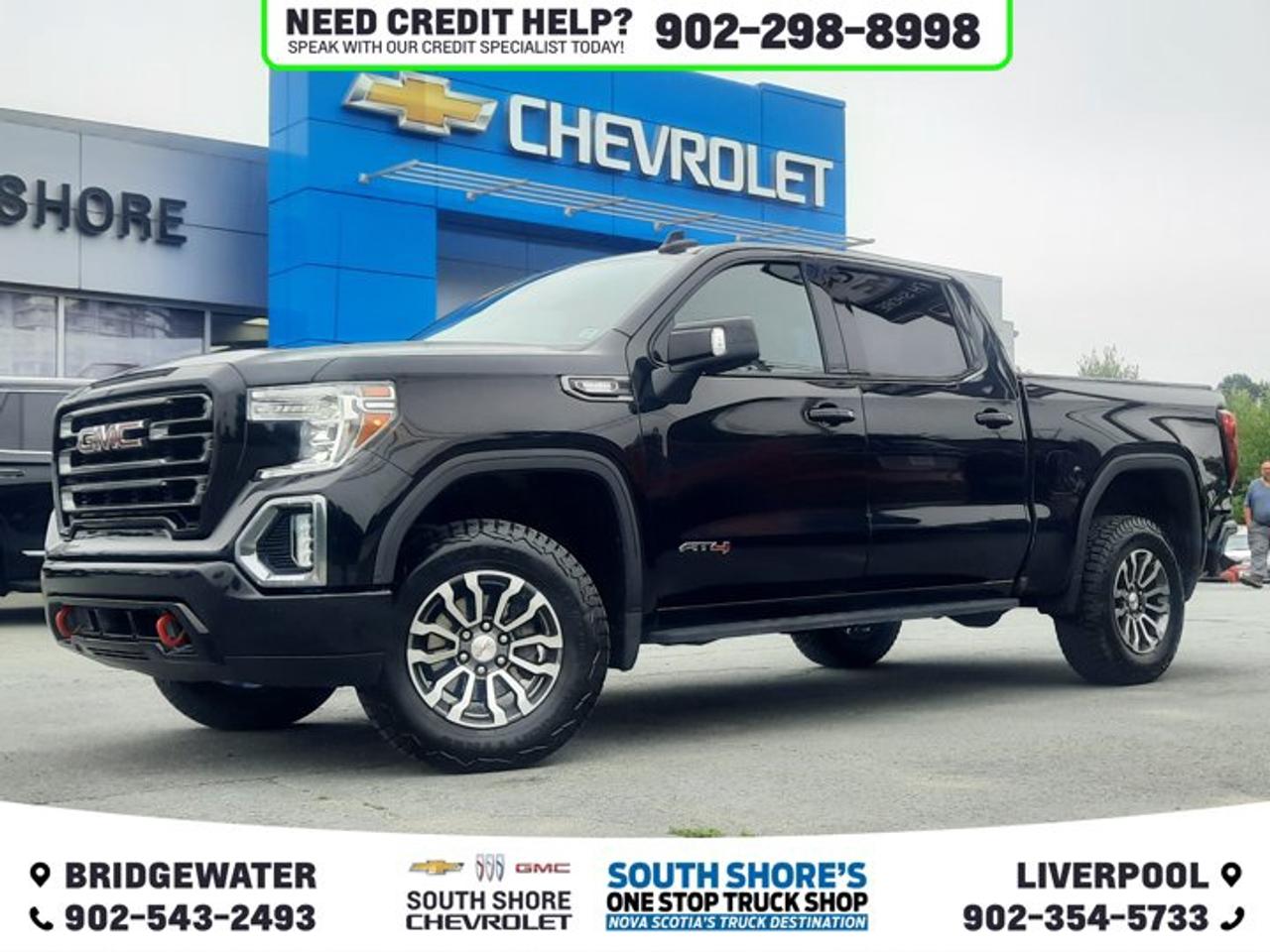 Recent Arrival! Odometer is 48535 kilometers below market average! Ebony Twilight Metallic 2022 GMC Sierra 1500 Limited AT4 For Sale, Bridgewater 4WD 10-Speed Automatic 3.0L I6 Clean Car Fax, 12-Volt Rear Auxiliary Power Outlet, 120-Volt Bed Mounted Power Outlet, 120-Volt Instrument Panel Power Outlet, 2 USB Ports, 2 USB Ports (1st Row), 4.2 Diagonal Colour Display Driver Info Centre, ABS brakes, Air Conditioning, Alloy wheels, Auto-dimming door mirrors, Auto-dimming Rear-View mirror, Auto-Locking Rear Differential, Automatic temperature control, Block heater, Body-Colour Surround Grille, Brake assist, Colour-Keyed Carpeting Floor Covering, Compass, Deep-Tinted Glass, Delay-off headlights, Driver door bin, Dual front impact airbags, Dual front side impact airbags, Electric Rear-Window Defogger, Electronic Stability Control, Engine Block Heater, Exterior Parking Camera Rear, Floor-Mounted Centre Console, Front Bucket Seats, Front fog lights, Front Prem Floor Liners w/Removable Carpet Insert, GMC Connected Access Capable, HD Rear Vision Camera, Heated door mirrors, Heated front seats, Heated Steering Wheel, Heavy-Duty Air Filter, Hill Descent Control, Hitch Guidance, Hitch Guidance w/Hitch View, Illuminated entry, In-Vehicle Trailering App, Integrated Trailer Brake Controller, Keyless Open & Start, LED Cargo Area Lighting, Manual Tilt-Wheel & Telescoping Steering Column, Memory seat, OnStar & GMC Connected Services Capable, Outside temperature display, Overhead airbag, Passenger door bin, Perforated Leather Front Seat Trim, Power Door Locks, Power door mirrors, Power Front Passenger Windows w/Express Up/Down, Power Front Windows w/Driver Express Up/Down, Power passenger seat, Power Rear Windows w/Express Down, Preferred Equipment Group 4SB, Premium audio system: Premium GMC Infotainment System, ProGrade Trailering System, Radio data system, Rear Dual USB Charging-Only Ports, Rear Prem Floor Liners w/Removable Carpet Insert, Rear reading lights, Rear Wheelhouse Liners, Rear window defroster, Red Recovery Hooks, Remote Vehicle Starter System, Security system, Speed-sensing steering, Spray-On Pickup Bed Liner w/AT4 Logo, Steering Wheel Audio Controls, Tachometer, Telescoping steering wheel, Theft Deterrent System (Unauthorized Entry), Tilt steering wheel, Traction control, Trailering Package, Trip computer, Variably intermittent wipers, Ventilated front seats, Voltmeter, Wi-Fi Hotspot Capable.