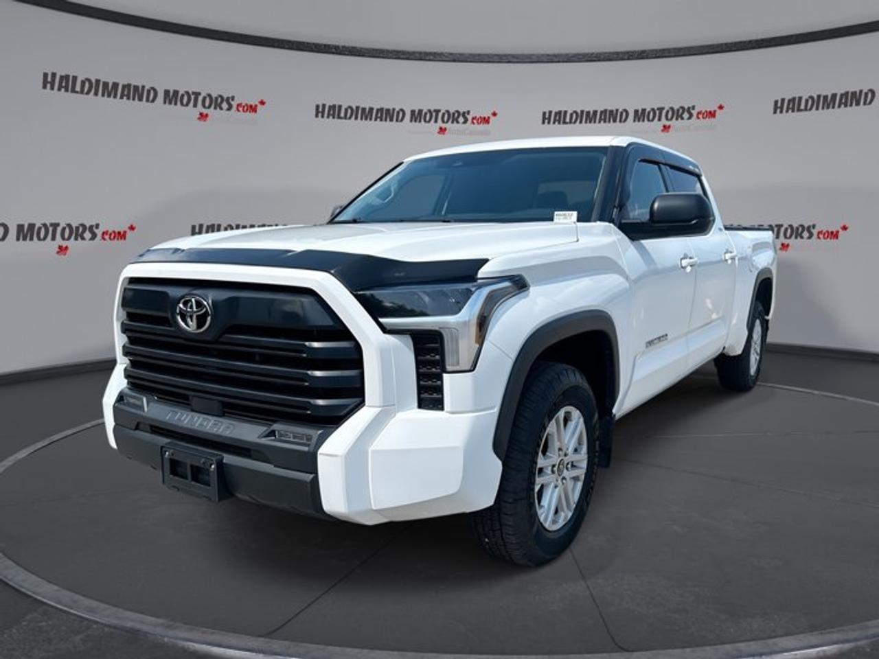 // ACCIDENT FREE!! //<br /><br />Built to handle hard work and daily life with equal ease, this 2023 Toyota Tundra SR5 Crewmax 6.5 4x4 | No Accidents | Heated Steering is a full-size pickup that brings strong capability, smart safety, and real comfort to every drive. Finished in White with a Black interior, it offers four full doors, automatic transmission, and a 3.4-litre unleaded engine.<br /><br />With 81,942 km on the odometer, this used Toyota pickup still delivers the confident feel drivers want from a modern truck. The Crewmax cabin adds roomy passenger space, while the 6.5-foot bed gives you practical flexibility for work gear, weekend projects, and travel needs around Cayuga and beyond.<br /><br />FEATURES OF THE Tundra SR5 Crewmax 6.5 4x4 | No Accidents | Heated Steering<br /><br />   Heated steering wheel for cold mornings<br />   Crewmax cab with four full doors<br />   6.5-foot bed adds useful versatility<br />   Four-wheel drive for year-round traction<br /><br />TRUCK FEATURES<br /><br />   Tows up to 4,989 kg confidently<br />   Trailer hitch ready for hauling duties<br />   Trailer brake controller supports steadier towing<br />   Rear tow hook adds utility<br /><br />ADVANCED SAFETY FEATURES<br /><br />   Backup camera helps with reversing<br />   Lane departure warning adds driving support<br />   Adaptive cruise control aids highway travel<br />   Side and head airbags enhance protection<br /><br />PERFORMANCE AND EFFICIENCY<br /><br />   3.4-litre unleaded engine delivers strong power<br />   Automatic transmission shifts smoothly and quickly<br />   Four-wheel drive boosts grip on rough roads<br />   Limited slip differential improves traction<br /><br />COMFORT AND CONVENIENCE<br /><br />   Heated front seats add winter comfort<br />   Dual-zone climate control keeps temperatures balanced<br />   Remote starter helps on cold days<br />   Power driver seat includes lumbar support<br /><br />TECHNONOLGY AND CONNECTIVITY<br /><br />   Apple CarPlay keeps apps within reach<br />   Android Auto adds easy phone integration<br />   Bluetooth connectivity supports hands-free communication<br />   Navigation system helps guide your route<br /><br />CARGO SPACE<br /><br />   6.5-foot bed supports larger loads<br />   Rear trunk access adds practical convenience<br />   Spacious cabin offers extra interior storage<br />   Crewmax layout gives flexible passenger room<br /><br />AWARDS & RECOGNITIONS<br /><br />   Best Resale Value, Canadian Black Book, 2023<br /><br />WHAT OTHER OWNERS LIKE<br /><br />   Strong towing power for work needs<br />   Spacious Crewmax cabin for family use<br />   Smooth ride for a full-size truck<br />   User-friendly tech and easy controls<br /><br />This 2023 Toyota Tundra SR5 Crewmax 6.5 4x4 | No Accidents | Heated Steering stands out with the right mix of truck strength and everyday refinement. Heated mirrors, power windows, power steering, tinted windows, automatic headlights, fog lights, and LED headlamps help make each trip easier, whether you are heading to the jobsite or out for the weekend.<br /><br />Inside, the cabin is designed to keep daily driving simple. You get front air conditioning, automatic climate control, steering wheel audio controls, push button start, satellite radio, HD Radio, illuminated vanity mirrors, and a leather-wrapped steering wheel. These details help create a truck that feels ready for commuting, errands, and long highway runs.<br /><br />This Toyota pickup also brings peace of mind with anti-lock braking system, stability control, tire pressure monitoring, child safety locks, and multiple airbags. Turn signal mirrors and a backup camera help when changing lanes or parking, while cruise control makes longer drives more relaxed and steady.<br /><br />If you want a dependable full-size truck with no accident history, strong towing ability, four-wheel drive confidence, and a well-equipped cabin, this Tundra is a smart choice. It delivers the utility truck buyers need while keeping comfort, technology, and safety close at hand for every season in Ontario.<br /><br />This 2023 Toyota Tundra SR5 Crewmax 6.5 4x4 | No Accidents | Heated Steerings VIN is: 5TFLA5EC8PX017074.<br /><br />WHY CHOOSE US? <br /><br />Honest & Transparent Buying Experience: Weve been a trusted name in business since 1984.<br /><br />STRAIGHTFORWARD PRICING:<br />Our Advertised Price Includes:<br />>>Safety Certification (No separate fee!)<br />>>30-Day 100% Mechanical Warranty<br />>>FREE Carfax History Report.<br />>>No upcharge for paying cash.<br />(Prices Exclude HST and Licensing Fees only.)<br /><br />>>Browse 300+ vehicles all in ONE LOCATION<br /><br />EASY FINANCING: Great rates & open loans<br /><br />WE BUY CARS: Get Top Dollar for your trade-in, or sell us your vehicle for CASH! Even if you dont buy from us!<br /><br />STOP BY TODAY<br />Treat yourself - stop by Haldimand Motors Ltd. located at 42 Talbot St E, Cayuga, ON N0A 1E0 to make this car yours today!<br /><br />https://www.haldimandmotors.com/used/stock-460633.html