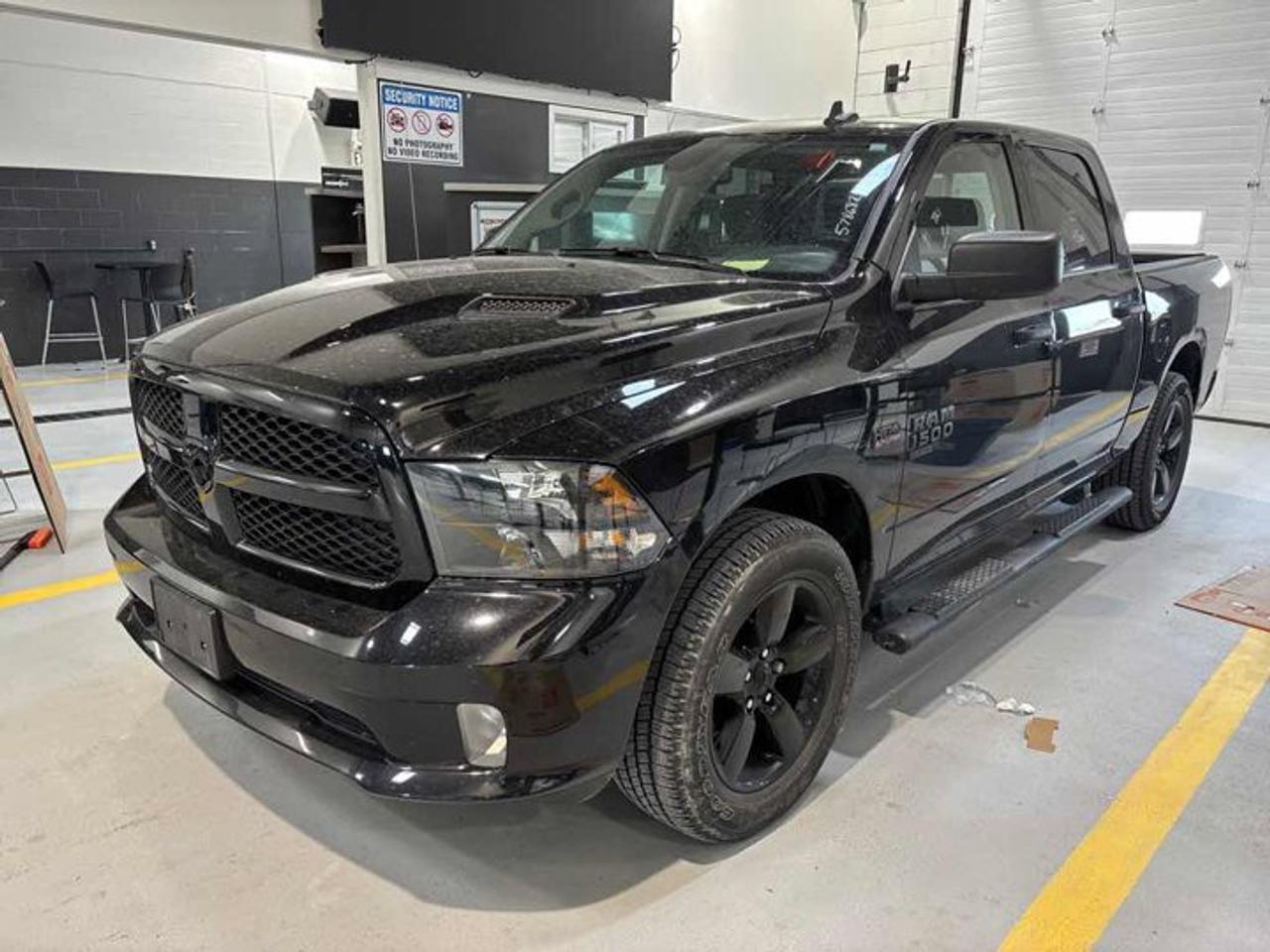 Check out this certified 2023 Ram 1500 Classic Express Crew Cab 4x4 | 5.7L Hemi | Night Edition | Sport Hood | Headed Seats + Steering | and More !. Its Automatic transmission and 5.7 L engine will keep you going. This Ram 1500 Classic comes equipped with these options: Remote Start, Heated Steering Wheel, Air Conditioning, Heated Seats, Tilt Steering Wheel, Steering Radio Controls, Power Windows, Power Locks, Traction Control, and Power Mirrors. Stop by and visit us at Mark Wilsons Better Used Cars, 5055 Whitelaw Road, Guelph, ON N1H 6J4.MASSIVE SELECTION: 500+ vehicles in ONE LOCATION, all Live Market Priced for the best value!STRAIGHTFORWARD & TRANSPARENT PRICING: Our Advertised Price INCLUDES:Safety Certification! (No separate certification fee upcharge).FREE Carfax History Report!NO upcharge for paying cash!CONFIDENCE & PEACE OF MIND: 30-Day/3,000 km Warranty INCLUDED! Plus a 5-Day Exchange Privilege!*EASY FINANCING: Better-than-bank rates, $0 Down, and 3 Months No Payments available OAC. BAD CREDIT APPROVED HERE!WE BUY CARS: Get Top Dollar for your trade, or sell us your vehicle for CASH even if you dont buy ours!www.shopwilsons.comAn Honest, Transparent Buying Experience. Trusted in business since 1961!(Cash Prices Exclude HST and Licensing Fees only.)