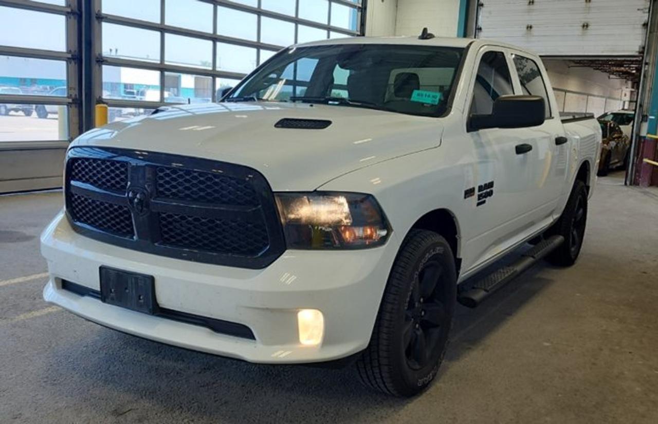 Come see this certified 2023 Ram 1500 Classic Express 4x4 | 5.7L Hemi | Night Edition | Heated Wheel + Seats | Bucket Seats | Carplay + Android. Its Automatic transmission and 5.7 L engine will keep you going. This Ram 1500 Classic comes equipped with these options: Heated Steering Wheel, Air Conditioning, Heated Seats, Tilt Steering Wheel, Steering Radio Controls, Power Windows, Power Locks, Traction Control, Power Mirrors, and Android Auto / Apple CarPlay. Stop by and visit us at Mark Wilsons Better Used Cars, 5055 Whitelaw Road, Guelph, ON N1H 6J4.MASSIVE SELECTION: 500+ vehicles in ONE LOCATION, all Live Market Priced for the best value!STRAIGHTFORWARD & TRANSPARENT PRICING: Our Advertised Price INCLUDES:Safety Certification! (No separate certification fee upcharge).FREE Carfax History Report!NO upcharge for paying cash!CONFIDENCE & PEACE OF MIND: 30-Day/3,000 km Warranty INCLUDED! Plus a 5-Day Exchange Privilege!*EASY FINANCING: Better-than-bank rates, $0 Down, and 3 Months No Payments available OAC. BAD CREDIT APPROVED HERE!WE BUY CARS: Get Top Dollar for your trade, or sell us your vehicle for CASH even if you dont buy ours!www.shopwilsons.comAn Honest, Transparent Buying Experience. Trusted in business since 1961!(Cash Prices Exclude HST and Licensing Fees only.)