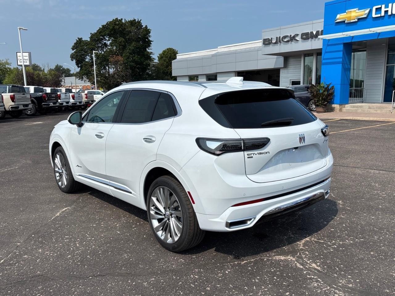 2026 Buick Envision Avenir New 2026 Luxurious 5 Passenger AWD SUV with 20 Pearl Nickel Alloy Wheels, Panoramic Sunroof, Head-Up Drivers Display, Heated and Cooled Front Seats, Heated Second Row Outboard Seats, Drivers Message S Photo