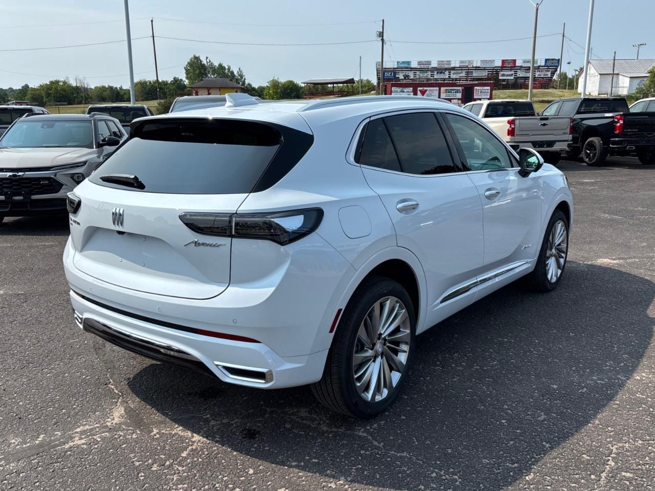 2026 Buick Envision Avenir New 2026 Luxurious 5 Passenger AWD SUV with 20 Pearl Nickel Alloy Wheels, Panoramic Sunroof, Head-Up Drivers Display, Heated and Cooled Front Seats, Heated Second Row Outboard Seats, Drivers Message S Photo