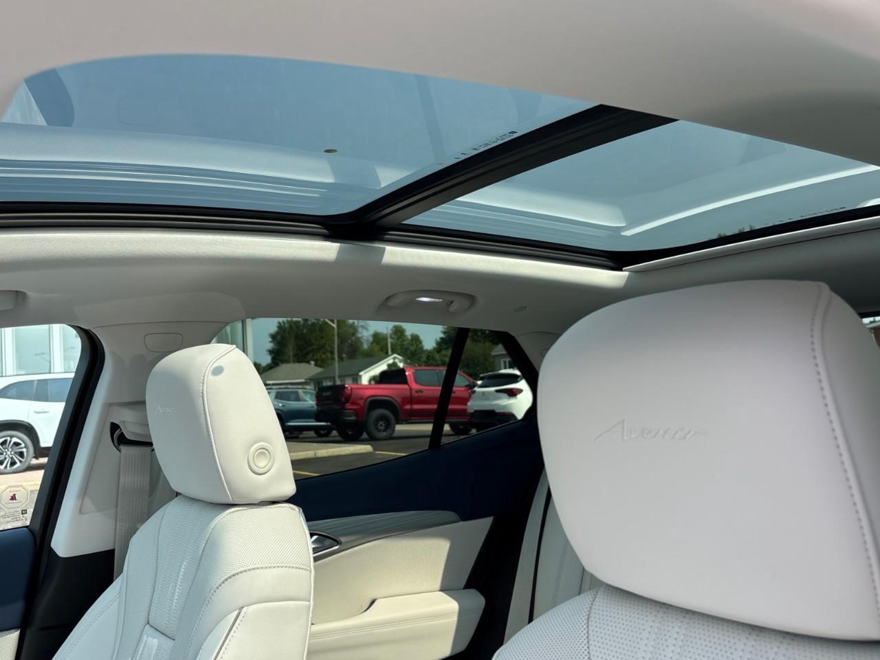 2026 Buick Envision Avenir New 2026 Luxurious 5 Passenger AWD SUV with 20 Pearl Nickel Alloy Wheels, Panoramic Sunroof, Head-Up Drivers Display, Heated and Cooled Front Seats, Heated Second Row Outboard Seats, Drivers Message S Photo