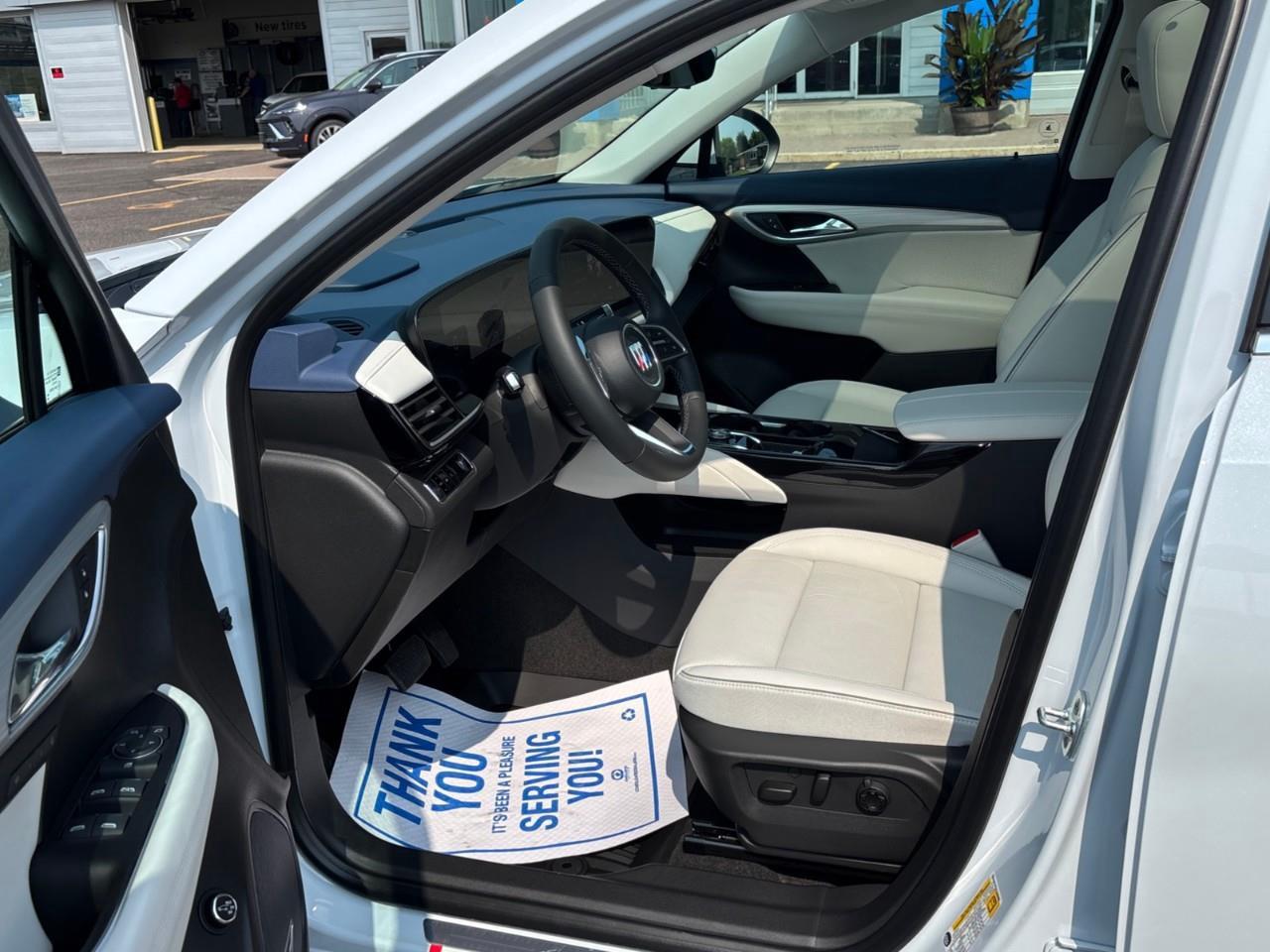 2026 Buick Envision Avenir New 2026 Luxurious 5 Passenger AWD SUV with 20 Pearl Nickel Alloy Wheels, Panoramic Sunroof, Head-Up Drivers Display, Heated and Cooled Front Seats, Heated Second Row Outboard Seats, Drivers Message S Photo