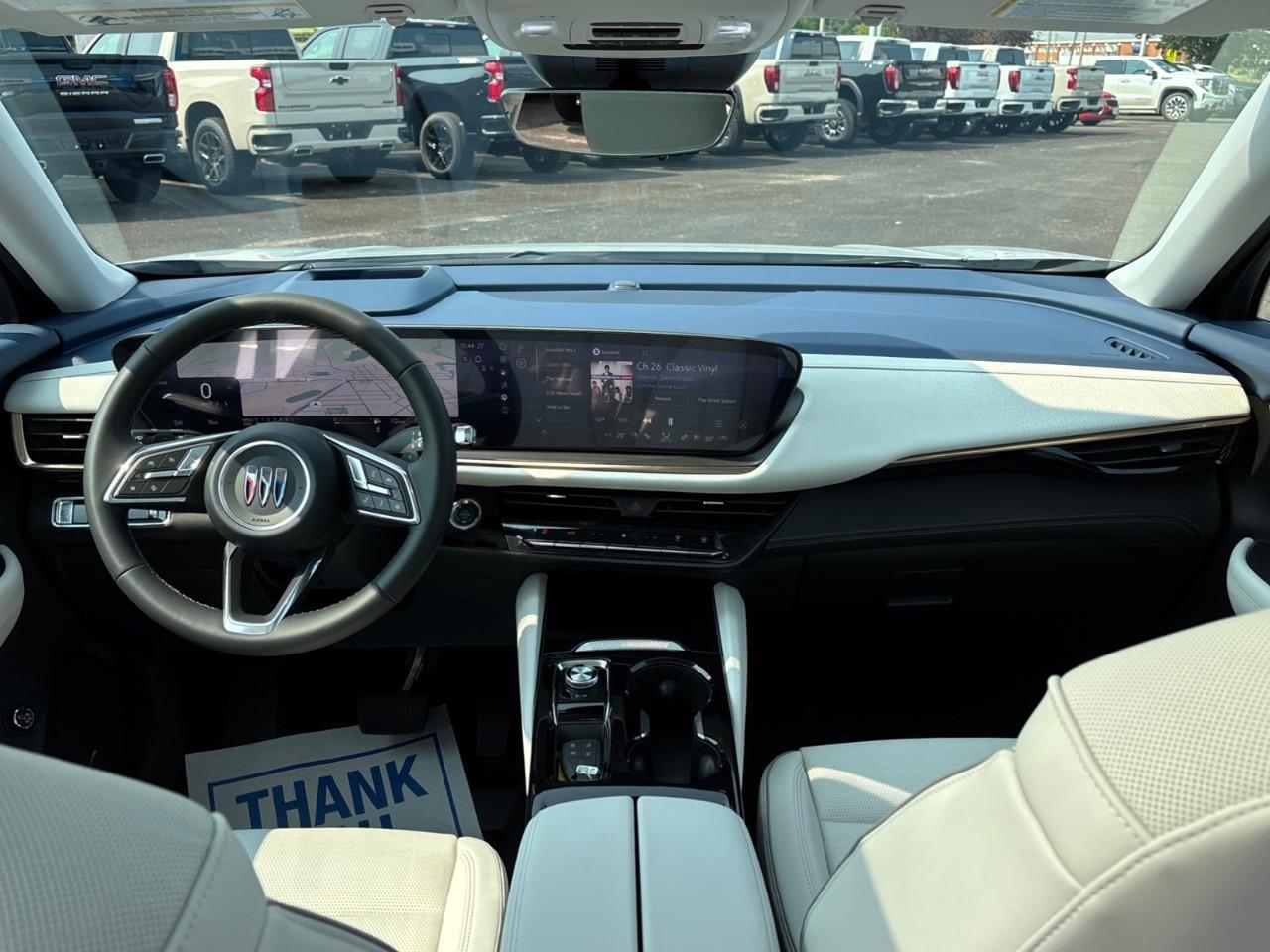 2026 Buick Envision Avenir New 2026 Luxurious 5 Passenger AWD SUV with 20 Pearl Nickel Alloy Wheels, Panoramic Sunroof, Head-Up Drivers Display, Heated and Cooled Front Seats, Heated Second Row Outboard Seats, Drivers Message S Photo