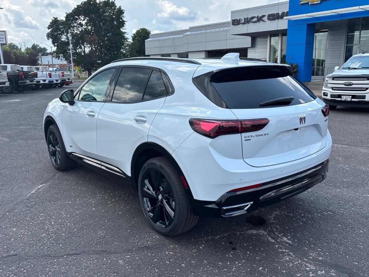 2026 Buick Envision Sport Touring New 2026 5 Passenger AWD SUV with Panoramic Sunroof, Heated Front Seats, Heated Steering Wheel, Heated Second Row Outboard Seats, Heads-Up Display, 30 Ultra-Wide Diagonal Screen, Adaptive Cruise Contr Photo