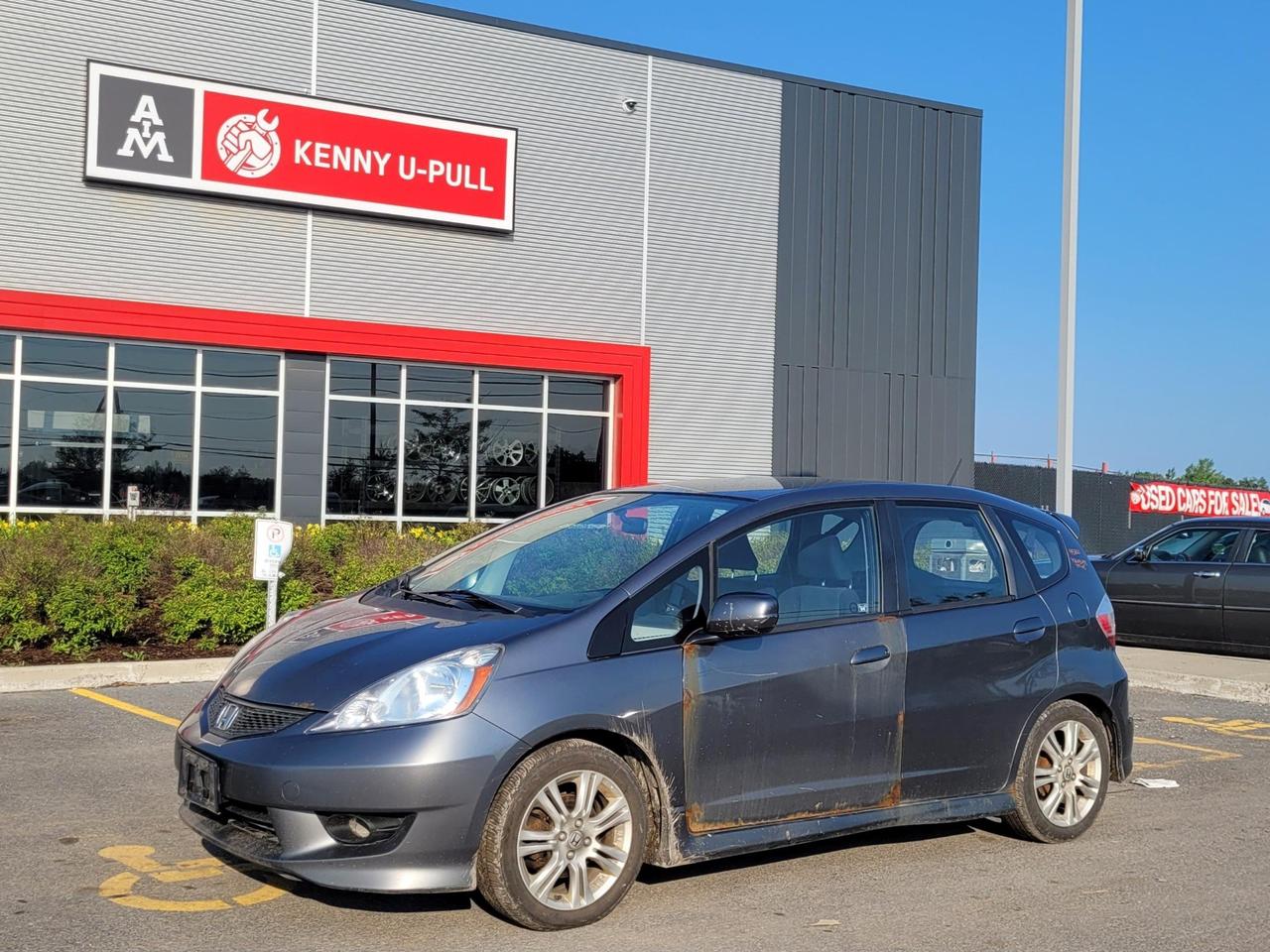 2011 Honda Fit Sport in Alabaster Silver Metallic. The vehicle has 244,013km. The vehicle runs and drives. One Owner. No Check engine light. Some imperfections/rust around the car. We dont perform any mechanical/safety inspections. The vehicle is sold as is and might need some work.