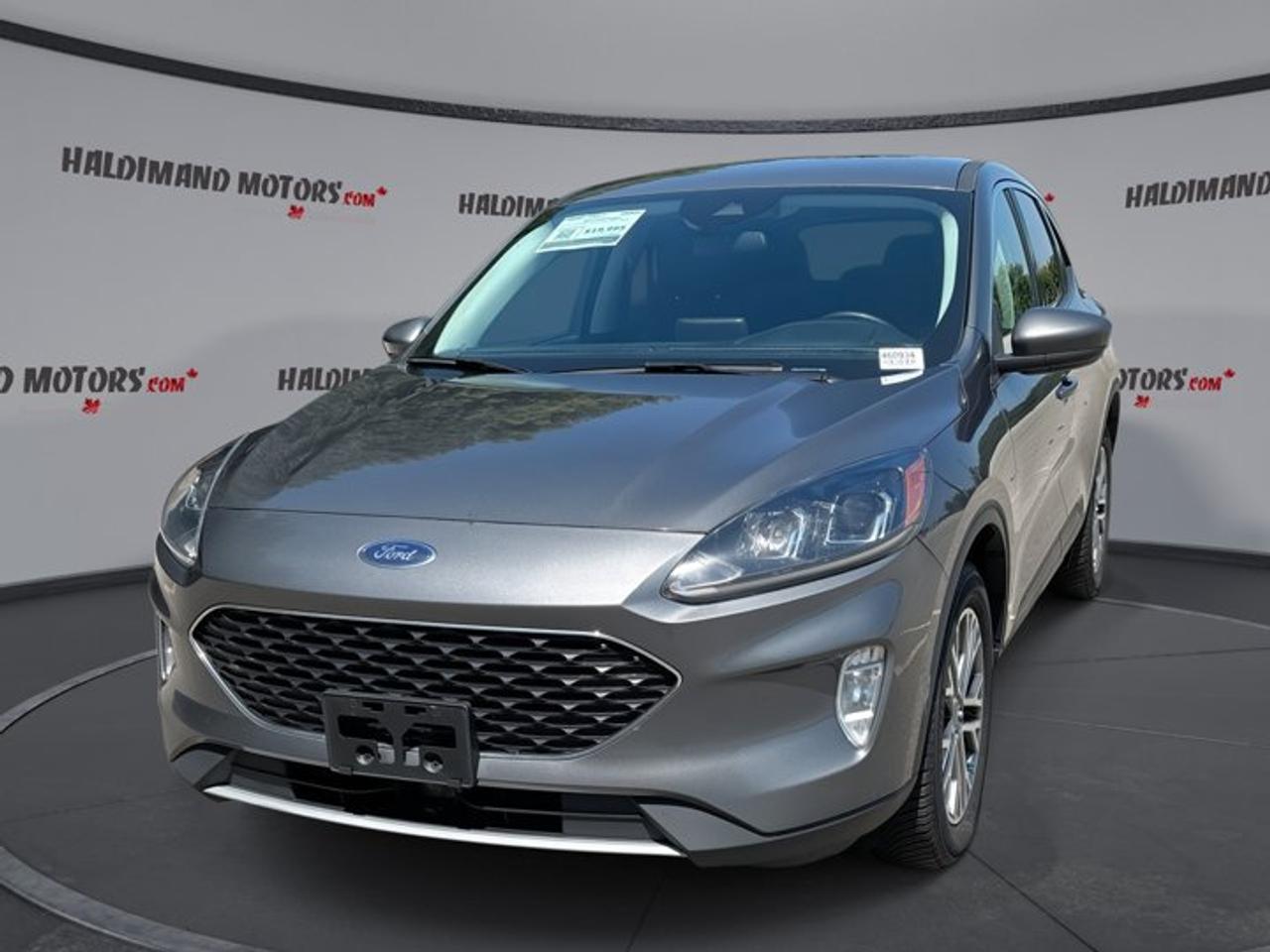 // ACCIDENT FREE!! //<br /><br />This 2022 Ford Escape SEL AWD is a smart compact SUV for daily life in Cayuga. It is finished in Grey with a Black interior, has 117,528 km, and offers all-wheel drive confidence with the comfort features many drivers want most.<br /><br />Well equipped and easy to enjoy, this used Ford Escape SEL AWD blends practical space, smooth automatic performance, and modern driver assistance. Its four-door layout, gas engine, and versatile cargo area make it a great fit for commuting, family errands, and weekend travel.<br /><br />FEATURES OF THE Escape SEL AWD | No Accidents | Leather Seats | Heated Steering<br /><br />   Accident-free history adds extra buying confidence<br />   Leather seats elevate everyday driving comfort<br />   Heated steering wheel helps on cold mornings<br />   All-wheel drive supports changing road conditions<br /><br />ADVANCED SAFETY FEATURES<br /><br />   Backup camera helps with reversing visibility<br />   Blind spot monitor adds lane-change awareness<br />   Lane departure warning supports safer travel<br />   Stability control helps maintain road composure<br /><br />PERFORMANCE AND EFFICIENCY<br /><br />   All-wheel drive boosts year-round road confidence<br />   Eight-speed automatic supports smooth shifting performance<br />   Gas engine balances everyday power and efficiency<br />   Limited slip differential aids traction delivery<br /><br />COMFORT AND CONVENIENCE<br /><br />   Heated front seats add winter comfort<br />   Dual-zone climate control helps personalize temperature<br />   Remote starter adds everyday seasonal convenience<br />   Power driver seat supports easy adjustment<br /><br />TECHNONOLGY AND CONNECTIVITY<br /><br />   Apple CarPlay connects familiar smartphone functions<br />   Android Auto adds simple device integration<br />   Navigation system helps guide every trip<br />   Bluetooth integration supports hands-free communication<br /><br />CARGO SPACE<br /><br />   Power liftgate makes loading easier daily<br />   Rear trunk access supports quick cargo loading<br />   Four-door design improves passenger and cargo entry<br />   Flexible SUV layout suits busy lifestyles<br /><br />AWARDS & RECOGNITIONS<br /><br />   Top Safety Pick, Insurance Institute for Highway Safety, 2022<br /><br />WHAT OTHER OWNERS LIKE<br /><br />   Comfortable ride quality for daily driving<br />   Useful cargo room for family errands<br />   Easy infotainment features and smartphone pairing<br />   Confident all-wheel drive in poor weather<br /><br />This 2022 Ford Escape SEL AWD gives you the features that matter most without overcomplicating the drive. Leather seats bring an upscale feel, while the heated steering wheel and heated front seats help make cold Ontario mornings much more pleasant.<br /><br />Its automatic transmission works well for city traffic and highway travel alike. Power steering and an adjustable steering wheel help keep the drive easy and controlled. Fog lights, automatic headlights, and heated mirrors also add useful support when weather and visibility change.<br /><br />Inside, the cabin is designed for comfort and simple operation. Dual-zone automatic climate control helps both front occupants stay comfortable. Ambient lighting adds a refined touch, while power windows, power door locks, and push button start make everyday use feel convenient and modern.<br /><br />Technology is another strong point in this Escape. Apple CarPlay, Android Auto, Bluetooth integration, satellite radio, WiFi hotspot capability, steering wheel audio controls, and built-in GPS help keep you connected, informed, and entertained whether you are heading across town or out on the highway.<br /><br />This Ford also offers valuable peace of mind through practical safety equipment. Anti-lock braking, multiple airbags, child safety locks, tire pressure monitoring, adaptive cruise control, and a passenger airbag sensor all contribute to a reassuring ownership experience.<br /><br />With its Grey exterior, Black interior, accident-free history, and strong list of sought-after features, this 2022 Ford Escape SEL AWD is a well-rounded SUV that delivers comfort, utility, and confidence in one appealing package at Haldimand Motors Ltd. in Cayuga.<br /><br />This 2022 Ford Escape SEL AWD | No Accidents | Leather Seats | Heated Steering VIN is: 1FMCU9H90NUB15475 .<br /><br />WHY CHOOSE US? <br /><br />Honest & Transparent Buying Experience: Weve been a trusted name in business since 1984.<br /><br />STRAIGHTFORWARD PRICING:<br />Our Advertised Price Includes:<br />>>Safety Certification (No separate fee!)<br />>>30-Day 100% Mechanical Warranty<br />>>FREE Carfax History Report.<br />>>No upcharge for paying cash.<br />(Prices Exclude HST and Licensing Fees only.)<br /><br />>>Browse 300+ vehicles all in ONE LOCATION<br /><br />EASY FINANCING: Great rates & open loans<br /><br />WE BUY CARS: Get Top Dollar for your trade-in, or sell us your vehicle for CASH! Even if you dont buy from us!<br /><br />STOP BY TODAY<br />Treat yourself - stop by Haldimand Motors Ltd. located at 42 Talbot St E, Cayuga, ON N0A 1E0 to make this car yours today!<br /><br />https://www.haldimandmotors.com/used/stock-460934.html