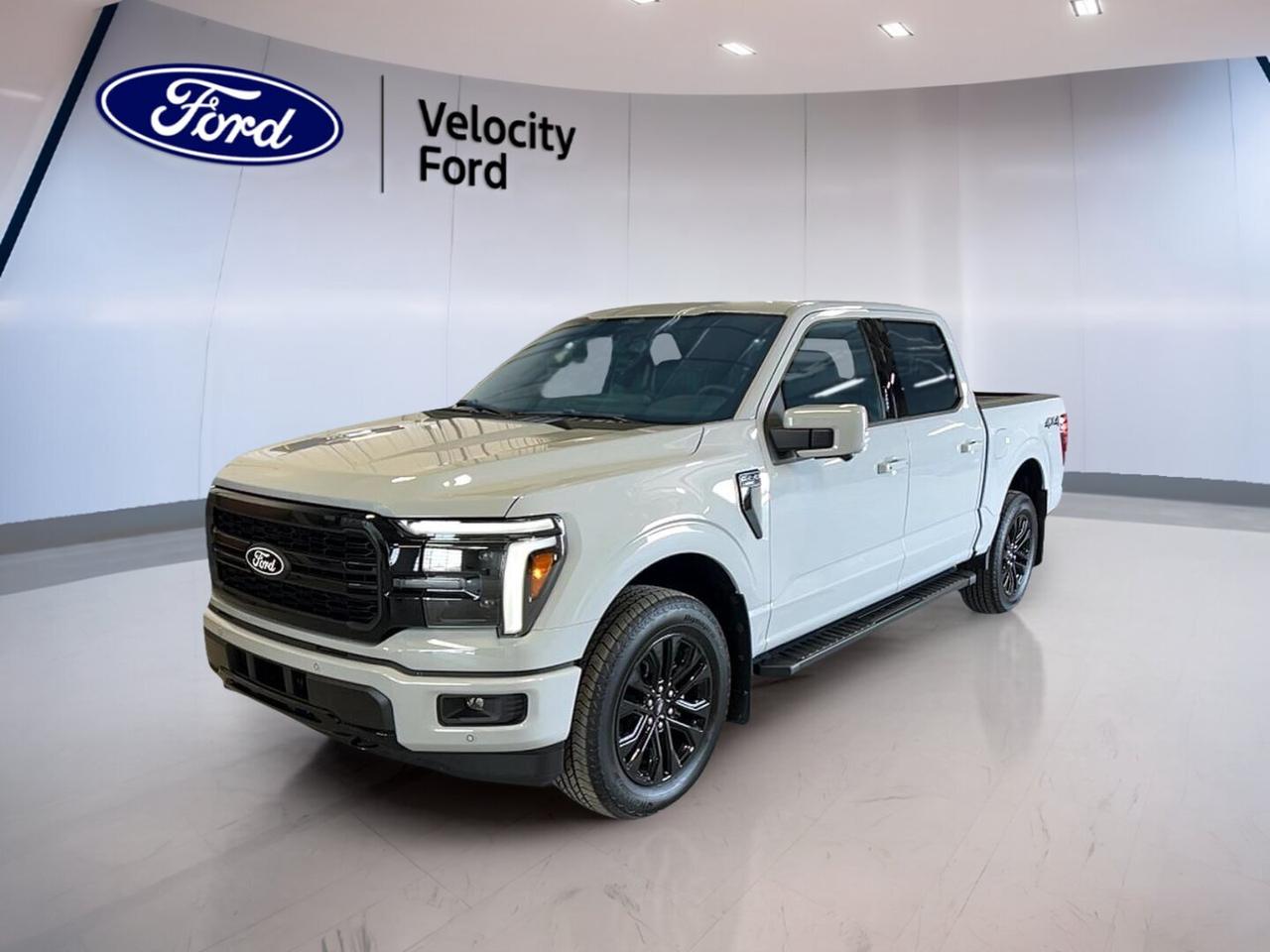 Meet the brand new 2026 Ford F-150 LARIAT 4WD SuperCrew 5.5 Box at Velocity Ford in Moose Jaw. This full-size truck pairs a White exterior with a Black interior and a strong 3.5-litre unleaded engine. With four doors, automatic transmission, and four-wheel drive, it is built for work, travel, and daily comfort.

The 2026 Ford F-150 LARIAT 4WD SuperCrew 5.5 Box brings a smart mix of strength, refinement, and modern utility. It offers the roomy SuperCrew cab buyers want, practical side steps, and a 5.5-foot box that is easy to load and use. This brand new truck is ready for tough tasks and smooth highway driving.

FEATURES OF THE F-150 LARIAT 4WD SuperCrew 5.5 Box
»» SuperCrew cab adds roomy rear seating
»» 5.5-foot box supports daily hauling
»» LARIAT trim blends work and comfort
»» Four-wheel drive boosts year-round traction

TRUCK FEATURES
»» Tows up to 4,671 kilograms confidently
»» Rear tow hook adds useful recovery support
»» Off-road tires help on rough surfaces
»» Side steps ease cabin entry

ADVANCED SAFETY FEATURES
»» Blind spot monitor supports safer lane changes
»» Lane departure warning helps avoid drifting
»» Backup camera aids reversing and parking
»» Anti-lock brakes enhance controlled stopping

PERFORMANCE AND EFFICIENCY
»» 3.5-litre unleaded engine delivers strong power
»» Automatic transmission shifts smoothly every day
»» Dual shift mode adds manual control
»» Four-wheel drive improves traction in Canada

COMFORT AND CONVENIENCE
»» Heated front seats add cold-weather comfort
»» Dual-zone climate control keeps temperatures balanced
»» Remote starter helps on cold mornings
»» Power windows add everyday convenience

TECHNOLOGY AND CONNECTIVITY
»» Navigation system helps guide every trip
»» Bluetooth integration supports hands-free calling
»» Wi-Fi hotspot helps keep devices connected
»» Satellite radio expands entertainment choices

CARGO SPACE
»» Rear trunk access supports easy loading
»» SuperCrew cabin adds secure interior storage
»» Spare tire offers added roadside confidence
»» Retractable mirrors help in tight spaces

WHAT OTHER OWNERS LIKE
»» Strong towing ability for work and play
»» Spacious cabin for family and crew
»» Smooth ride for a full-size truck
»» Useful technology for daily driving

Finished in White with a Black interior, this 2026 Ford F-150 LARIAT 4WD SuperCrew 5.5 Box also includes cruise control, power steering, stability control, child safety locks, heated mirrors, power mirrors, steering wheel audio controls, memory seats, adjustable pedals, tinted windows, automatic headlights, fog lights, tire pressure monitoring, HD Radio, and LED headlamps.

This brand new 2026 Ford F-150 LARIAT 4WD SuperCrew 5.5 Box is a great fit for drivers who want proven truck capability with upscale comfort and useful technology. From towing and traction to cabin space and connected features, it is equipped for life in Moose Jaw and beyond.

This 2026 Ford F-150 LARIAT 4WD SuperCrew 5.5 Boxs VIN is: 1FTFW5L8XTFB49461.