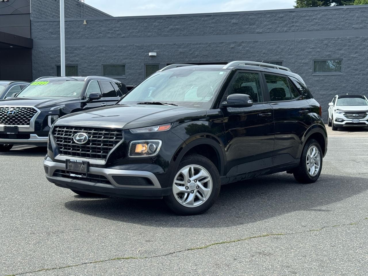 Apple CarPlay & Android Auto | Heated Front Seats | Heated Steering Wheel | Blind Spot Collision Avoidance Assist | Lane Keeping Assist | Remote Start | Backup Camera | Fuel Efficient | No Accidents<br><br>2025 Hyundai Venue Preferred FWD<br><br>This 2025 Hyundai Venue Preferred FWD is now available at White Rock Hyundai, offering outstanding fuel efficiency, modern technology, and everyday practicality in a stylish subcompact SUV. Powered by an efficient 1.6L engine and paired with front wheel drive, this Venue delivers a comfortable and responsive driving experience thats ideal for city commuting and weekend getaways. Its compact size makes parking effortless, while the surprisingly spacious interior makes it a smart choice for drivers throughout White Rock, South Surrey, Surrey, Delta, Langley, and Vancouver.<br><br>Inside, this Hyundai Venue Preferred is well equipped with features such as Apple CarPlay, Android Auto, heated front seats, a heated steering wheel, remote start, and a backup camera. Advanced safety technologies including Blind Spot Collision Avoidance Assist and Lane Keeping Assist help provide added confidence behind the wheel, while the versatile cabin offers comfortable seating and practical cargo space for everyday life. Combining modern styling, excellent efficiency, and Hyundais reputation for value, this compact SUV is ready for any adventure. If youre searching for a used Hyundai Venue for sale in White Rock, this 2025 Hyundai Venue Preferred FWD delivers the technology, comfort, and practicality that compact SUV buyers are looking for.<br><br>Why Buy From White Rock Hyundai?<br>* 7x Hyundai Presidents Award of Merit Winner<br>* 3x Consumer Choice Award for Business Excellence<br>* AutoTrader Dealer of the Year<br><br>M-Promise Certified Pre-Owned ($995 value) includes:<br>* 30-day / 2,000 km Exchange Program<br>* 3-day / 300 km Money Back Guarantee<br>* Comprehensive 144-Point Mechanical Inspection<br>* Full Synthetic Oil Change<br>* BC Verified CARFAX<br>* Minimum 6 Month Powertrain Warranty<br><br>Hyundai Certified Pre-Owned Benefits<br>* 144-Point Inspection<br>* CARFAX Vehicle History Report<br>* Transferable 6-Year / 120,000 km Powertrain Limited Warranty (This is an additional 1 year/20, 000 km beyond the original factory warranty)<br>* 1 Year 24-Hour Roadside Assistance<br>* Preferred Financing Rates Available OAC<br>* 30-Day / 2,000 km Exchange Privilege<br><br>Buy with confidence at White Rock Hyundai. Our vehicles are priced competitively based on market demand, condition, and kilometres to give our customers a transparent and hassle-free buying experience.<br><br>Visit White Rock Hyundai today to test drive this 2025 Hyundai Venue Preferred FWD. We proudly serve drivers in White Rock, South Surrey, Surrey, Delta, Langley, and Vancouver with quality pre-owned vehicles and a professional, no-pressure experience.<br><br>Contact our team today to confirm availability, explore financing options, and reserve this vehicle.<br><br>* All vehicle purchases are subject to a $799 administration fee. Dealer #31129.