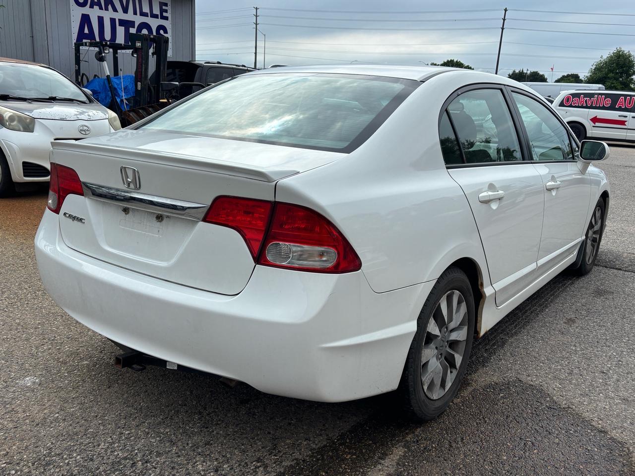 2010 Honda Civic 4dr Auto EX-L Photo