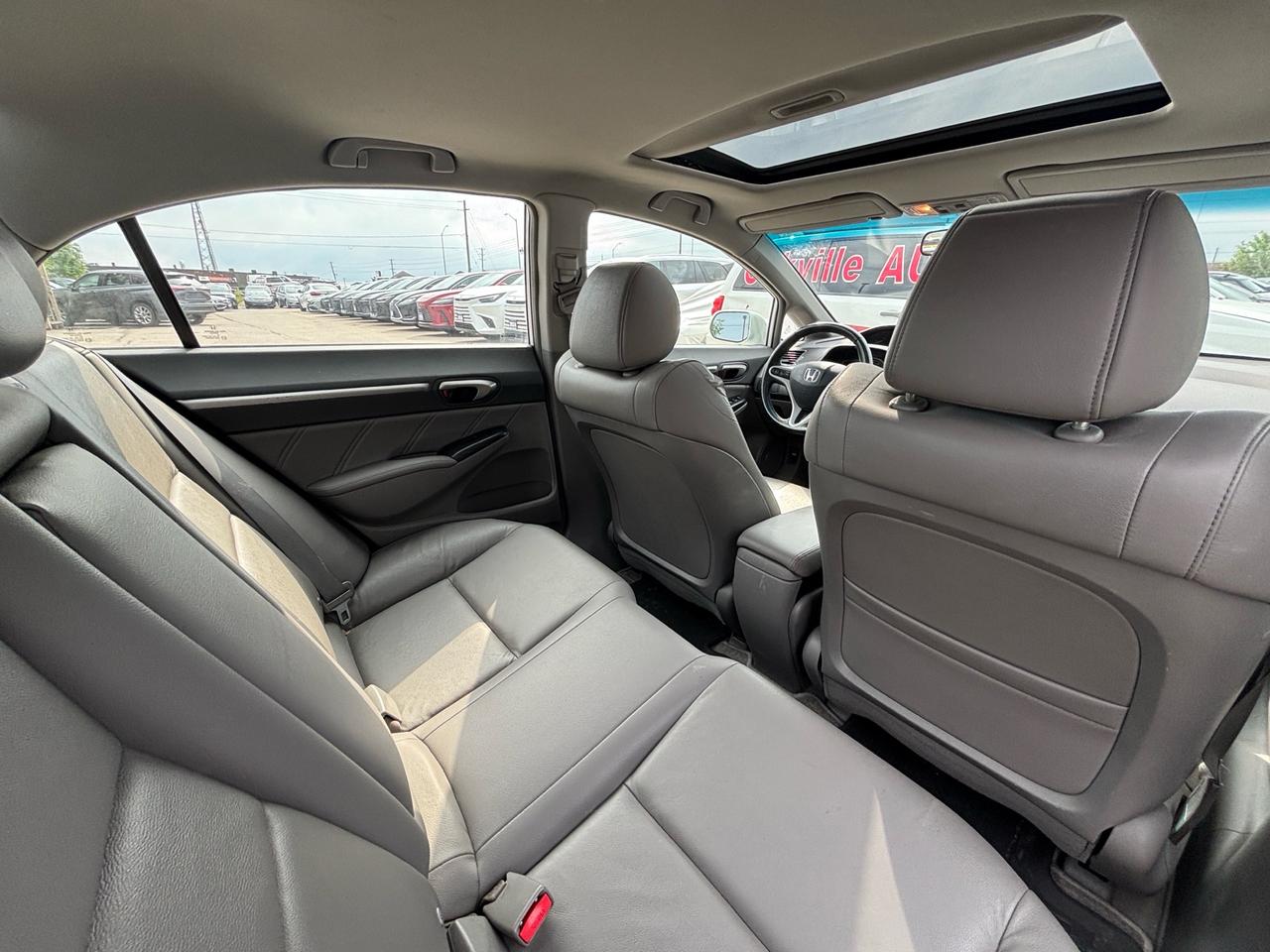 2010 Honda Civic 4dr Auto EX-L Photo